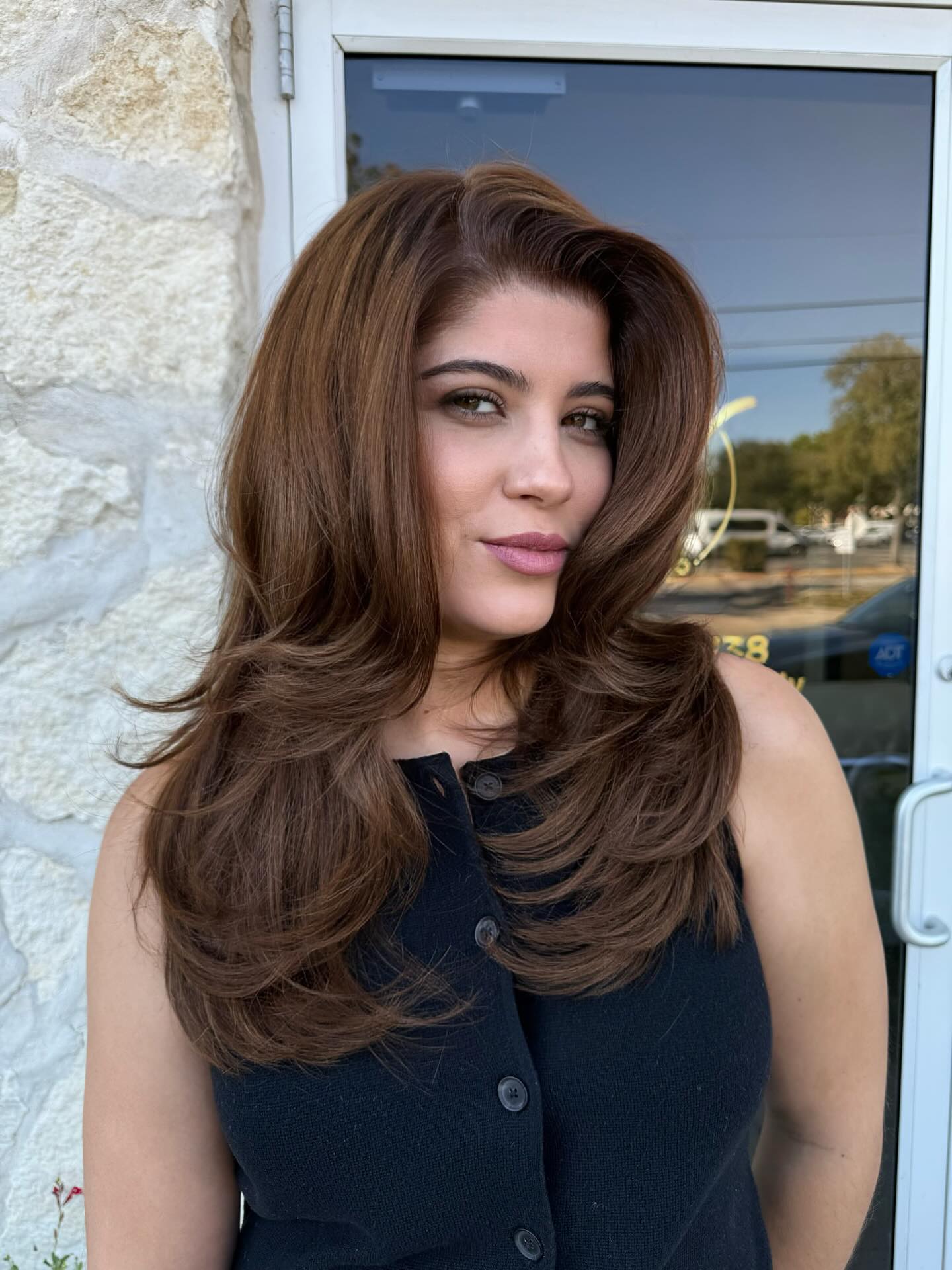 Voluminous Brunette Layers with Dynamic Movement