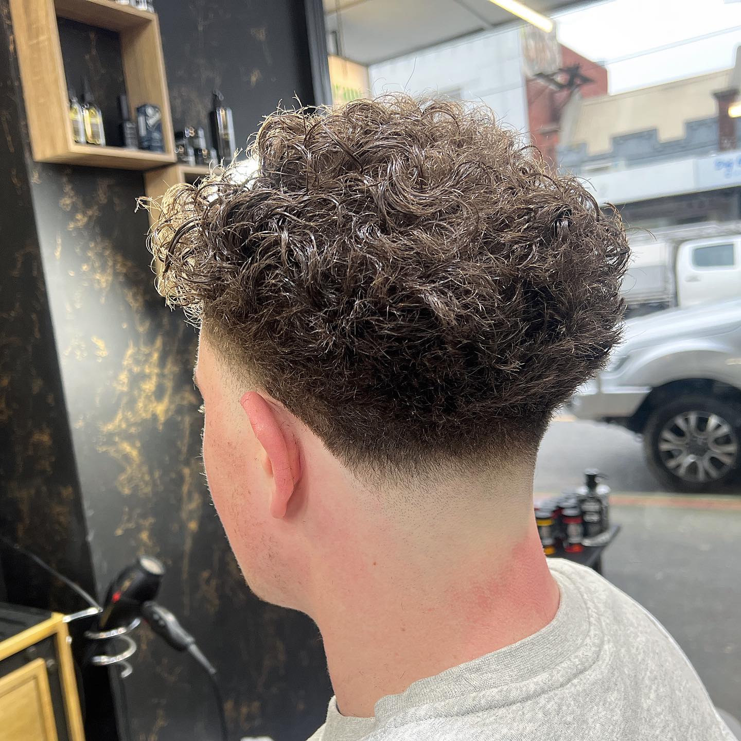 Curly Taper Fade with Defined Curls