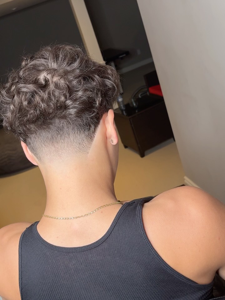 Modern Curly Taper Fade with Defined Texture
