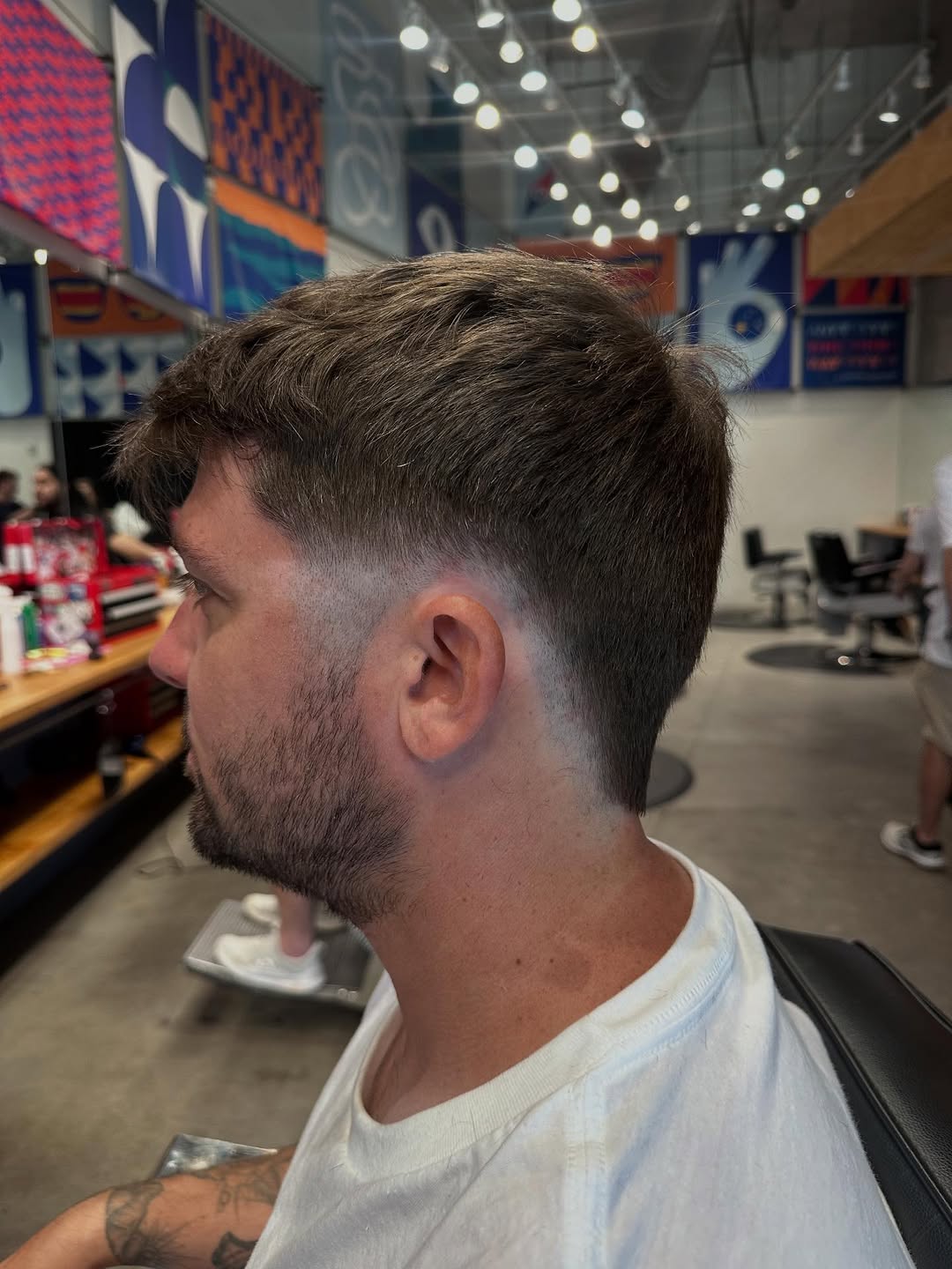 Textured Burst Fade Mohawk with Clean Edges