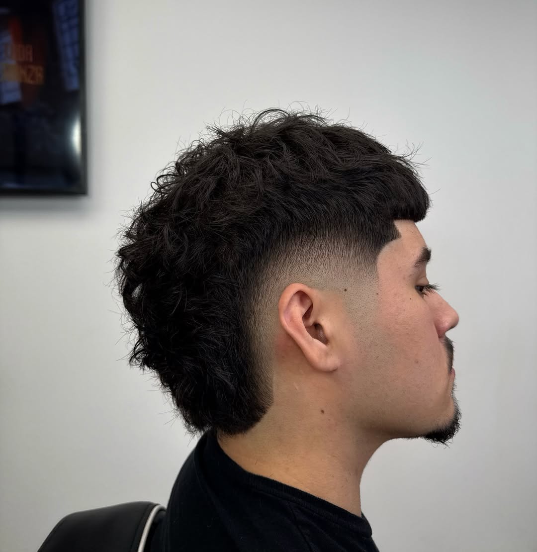 Textured Burst Fade Mohawk with Defined Length