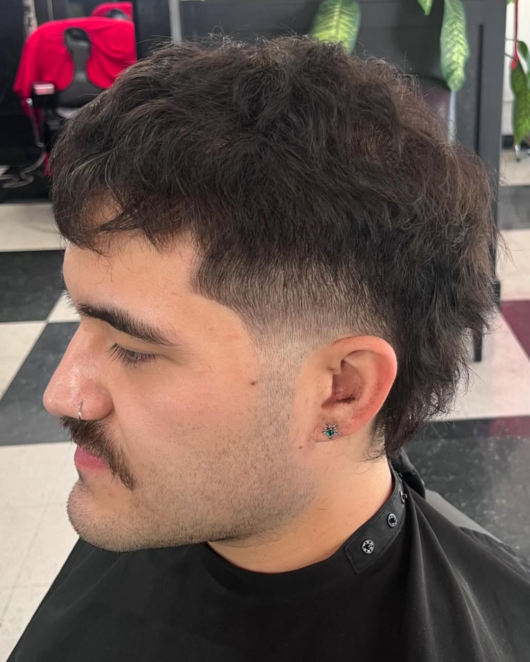 Textured Burst Fade Mohawk with Natural Curls