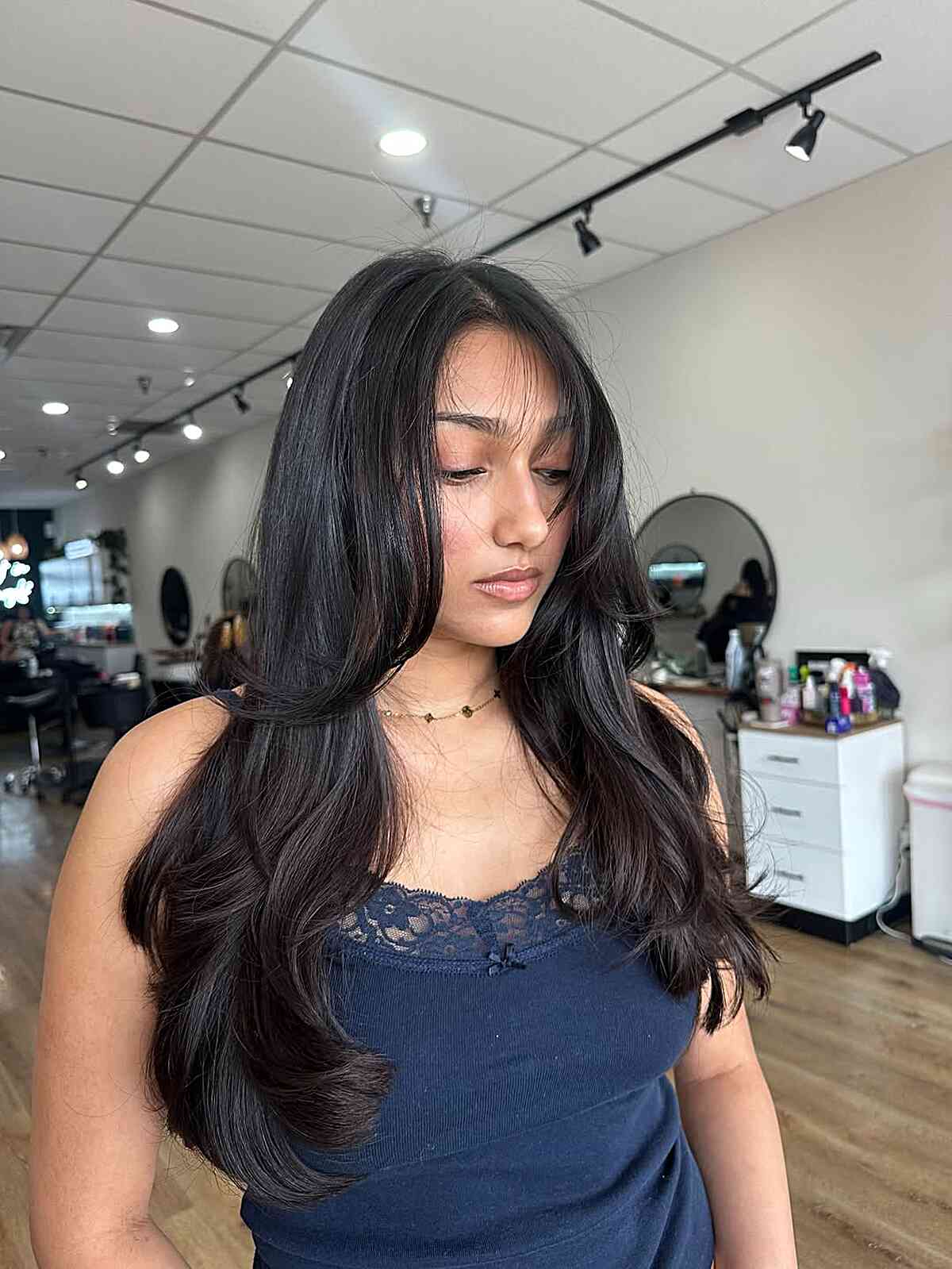 Long Layers with Curtain Bangs and Face Framing