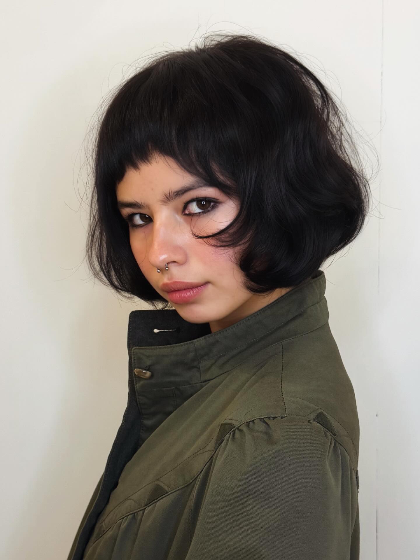 Chin-Length Rounded Bob with Point-Cut Micro Fringe and Interior Graduation