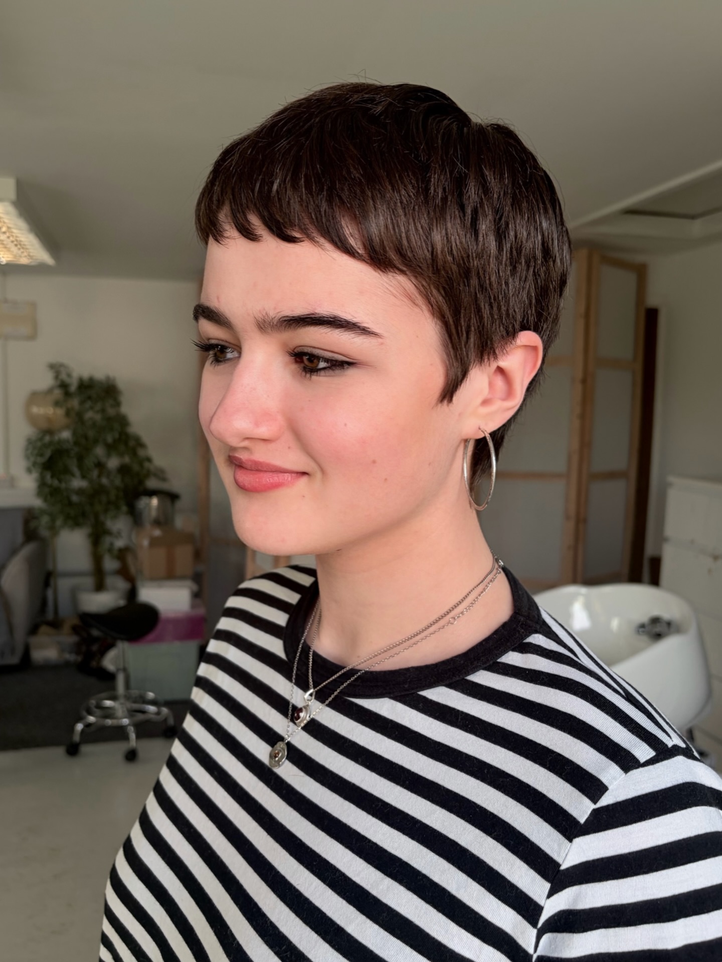Rounded Textured Micro-Bang Pixie with Soft Tapered Nape