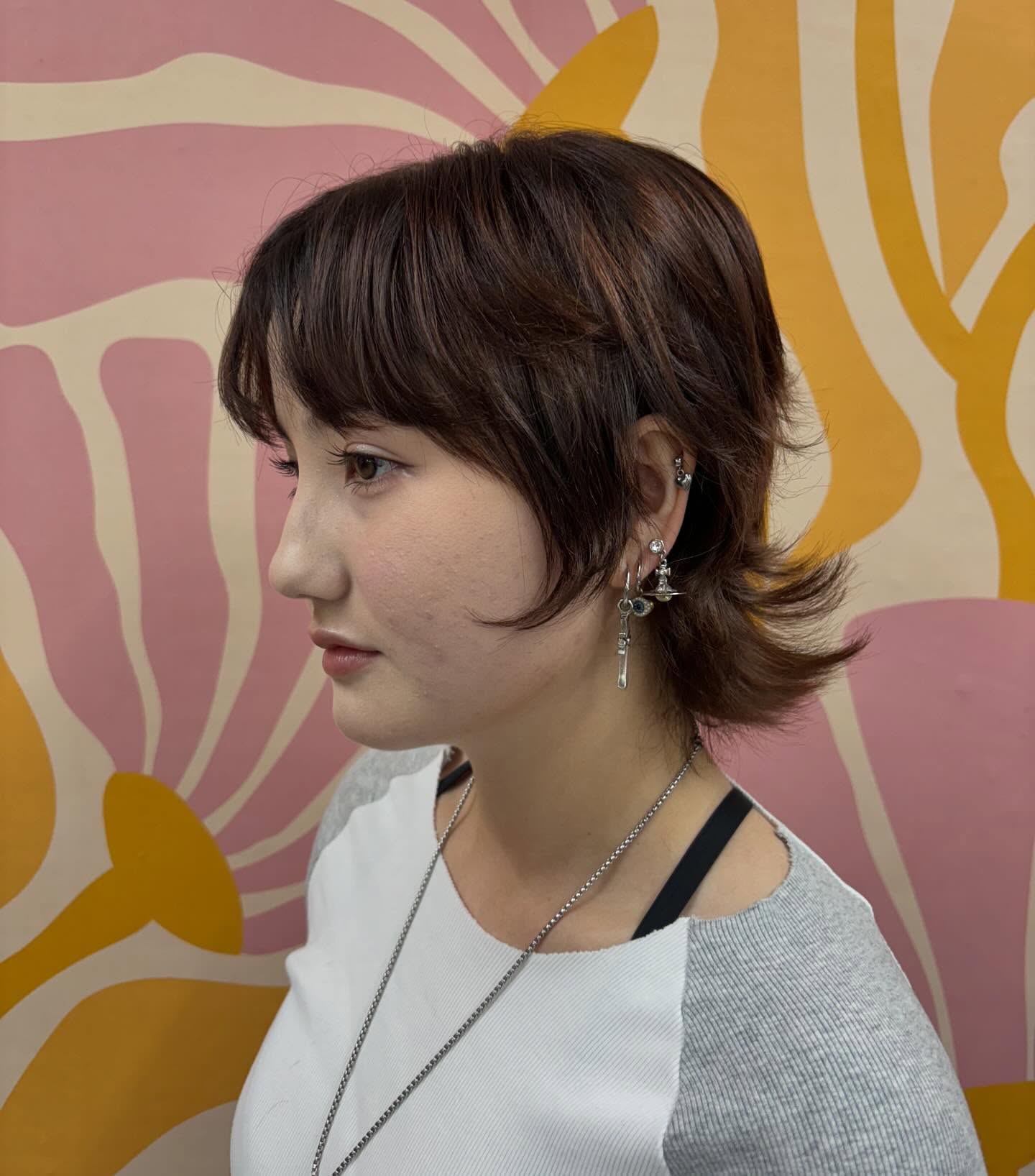 Short Flipped Shag with Cheek-Length Tendrils and Feathered Nape