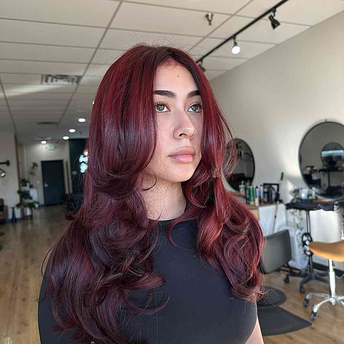 Vibrant Dark Red Long Layers with Soft Waves