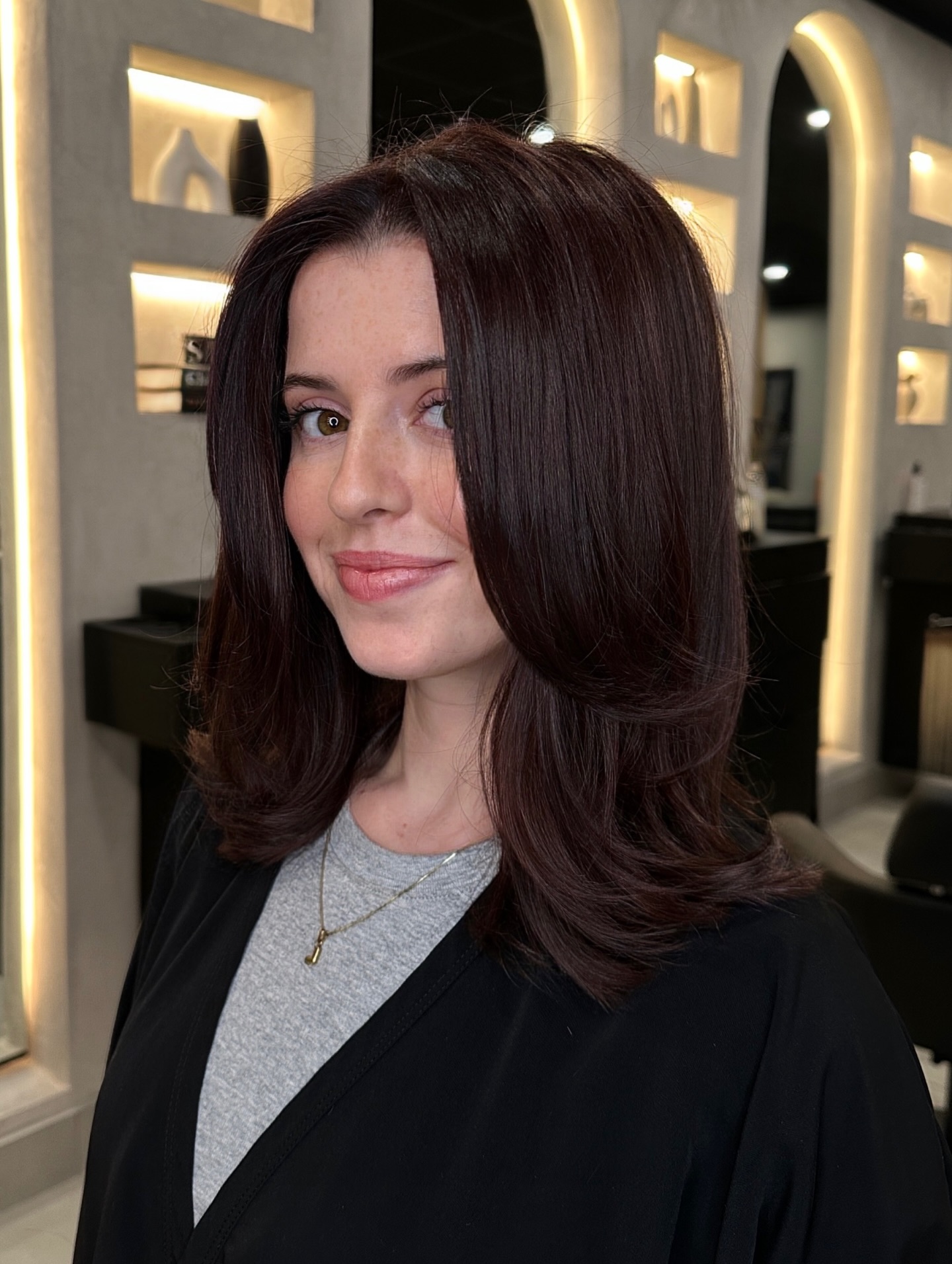 Center-Part Face-Framing Long Layers with Blown-Out Ends