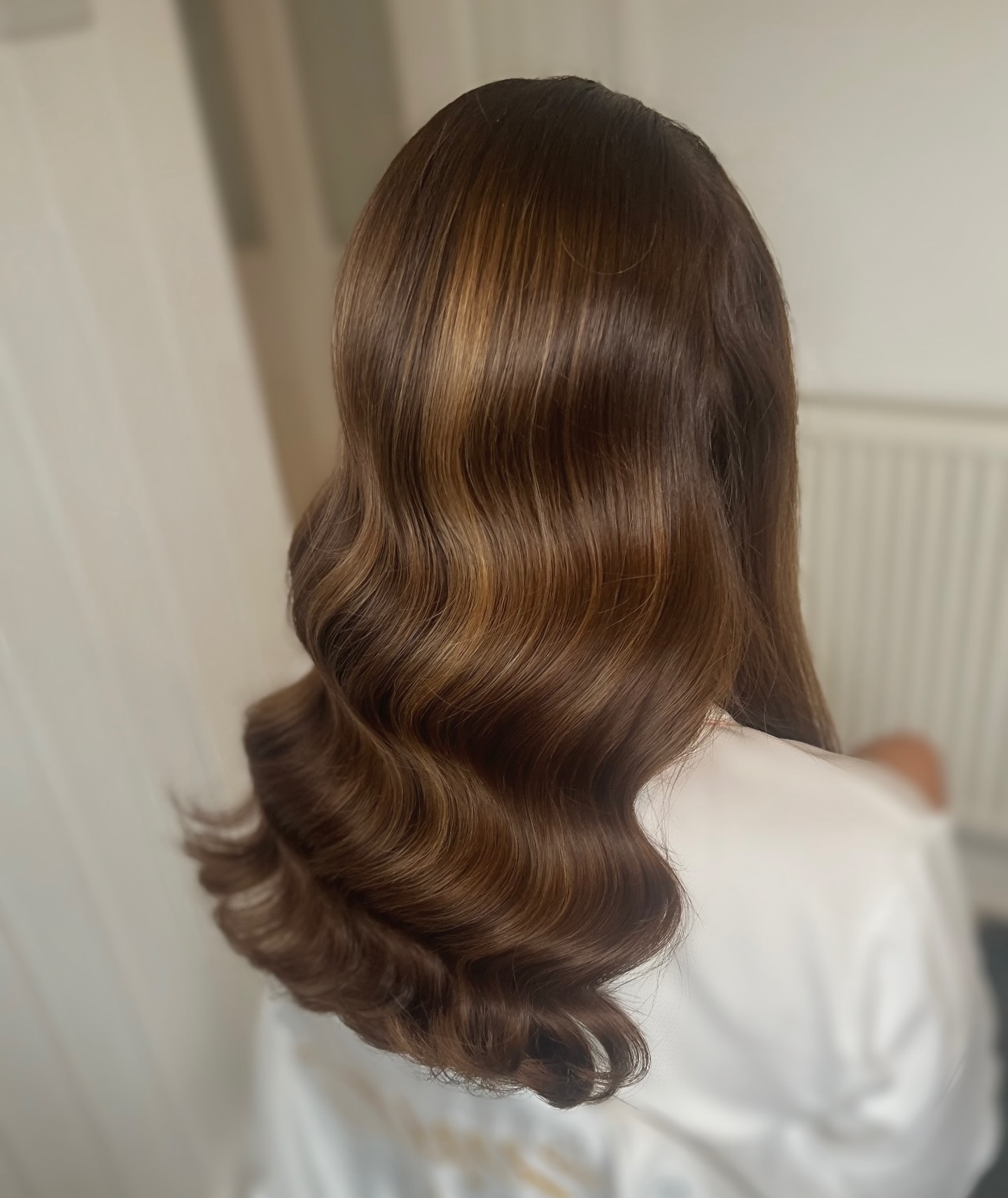 Chestnut Sculpted S-Waves with Off-Center Sunlit Streak