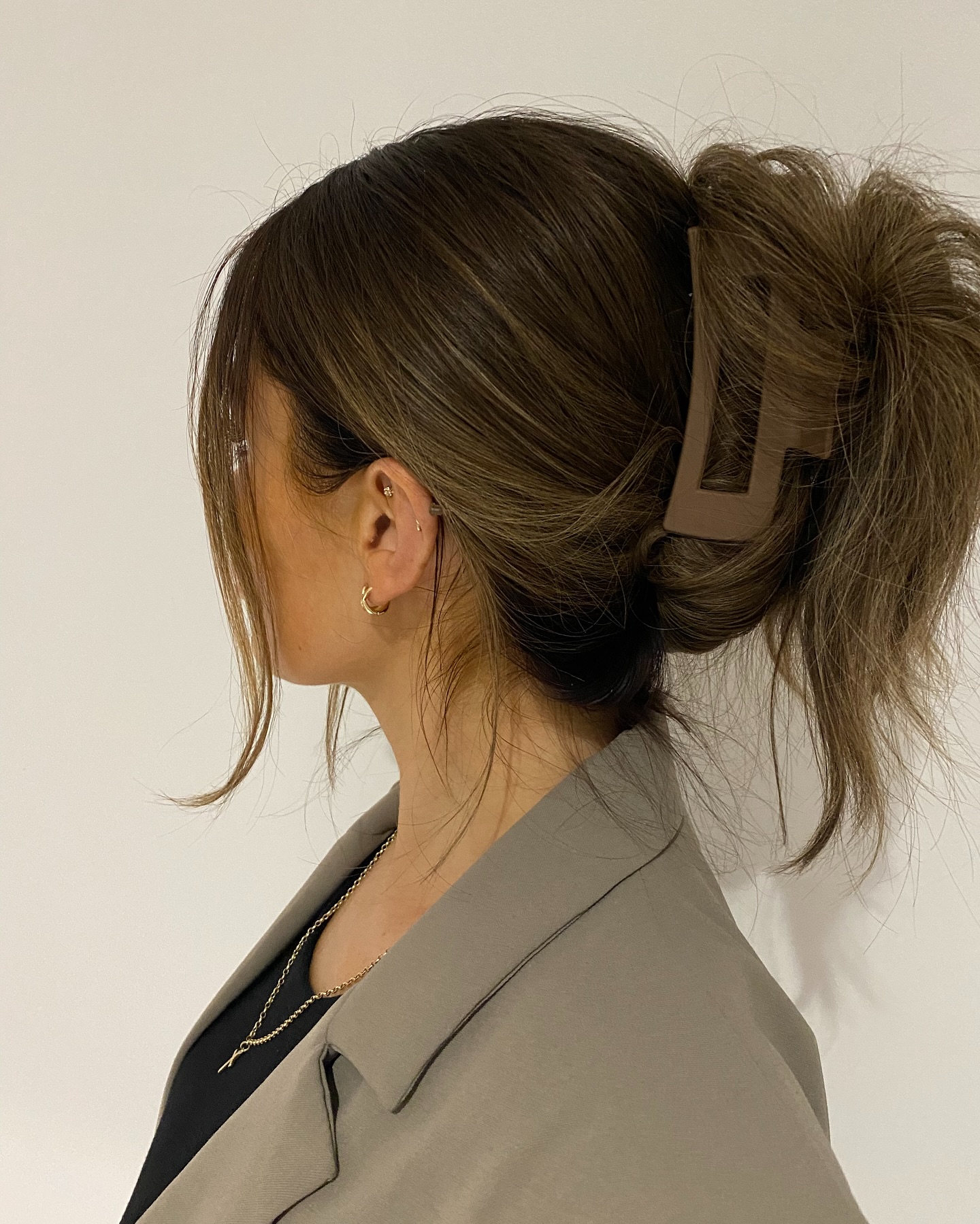 Chunky Claw-Clip Low Bun with Soft Curtain Face-Framing