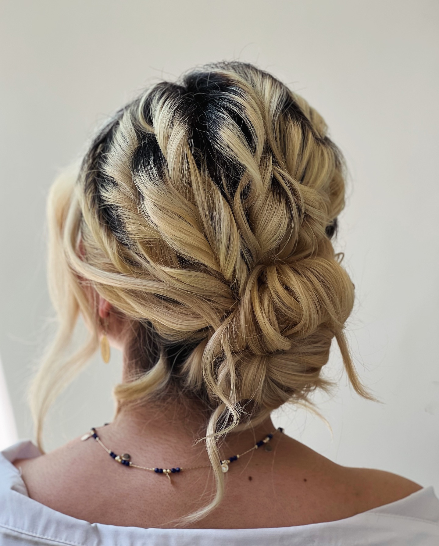 Chunky Twisted Low Knotted Updo with Root Shadow