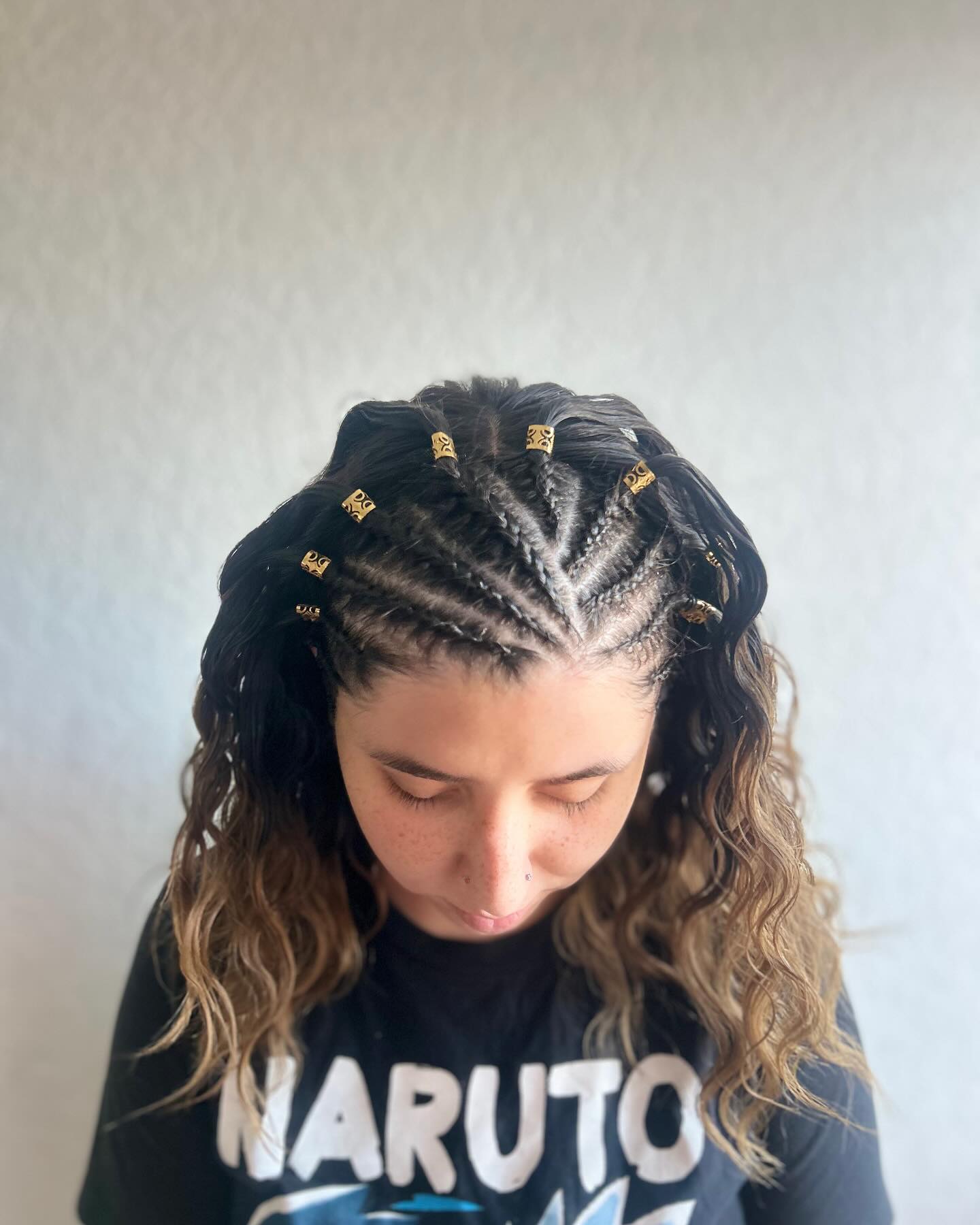Curved Feed-In Cornrow Crown with Loose Wavy Ends and Gold Cuffs