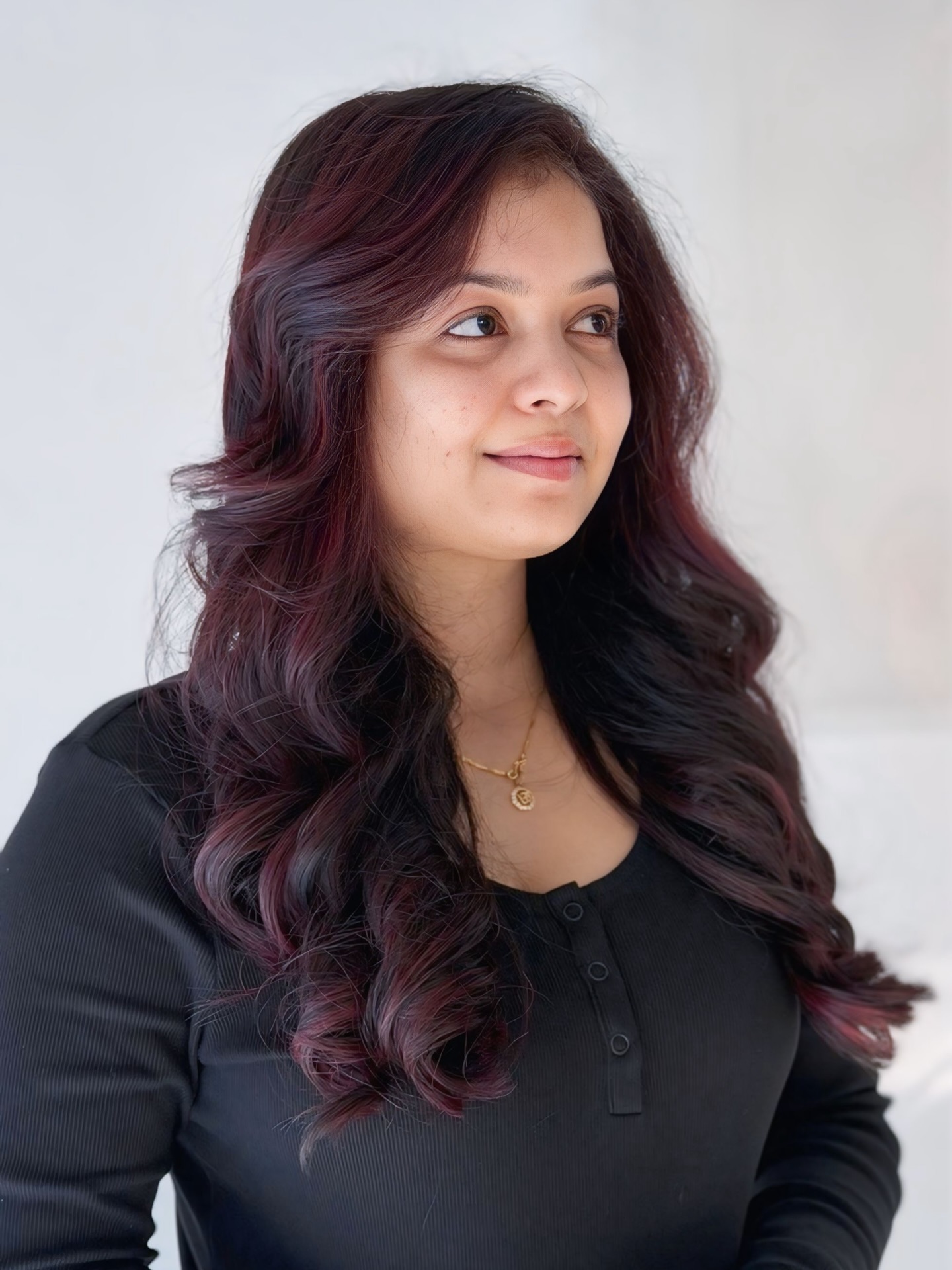 Deep Plum-Glazed Long Layers with Face-Framing S-Waves