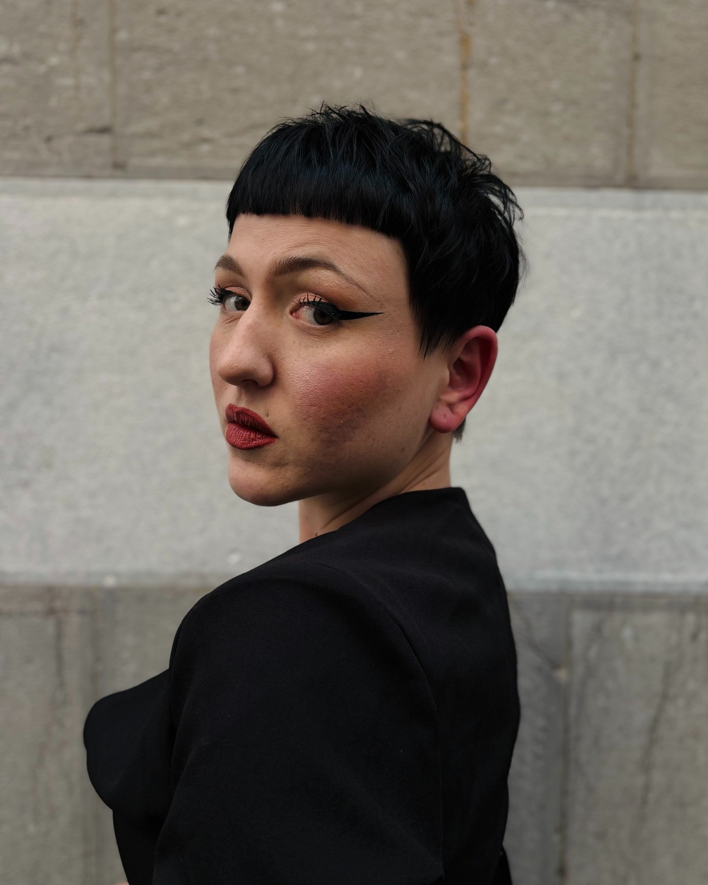 Edgy Micro-Bang Textured Pixie with Softly Tapered Nape