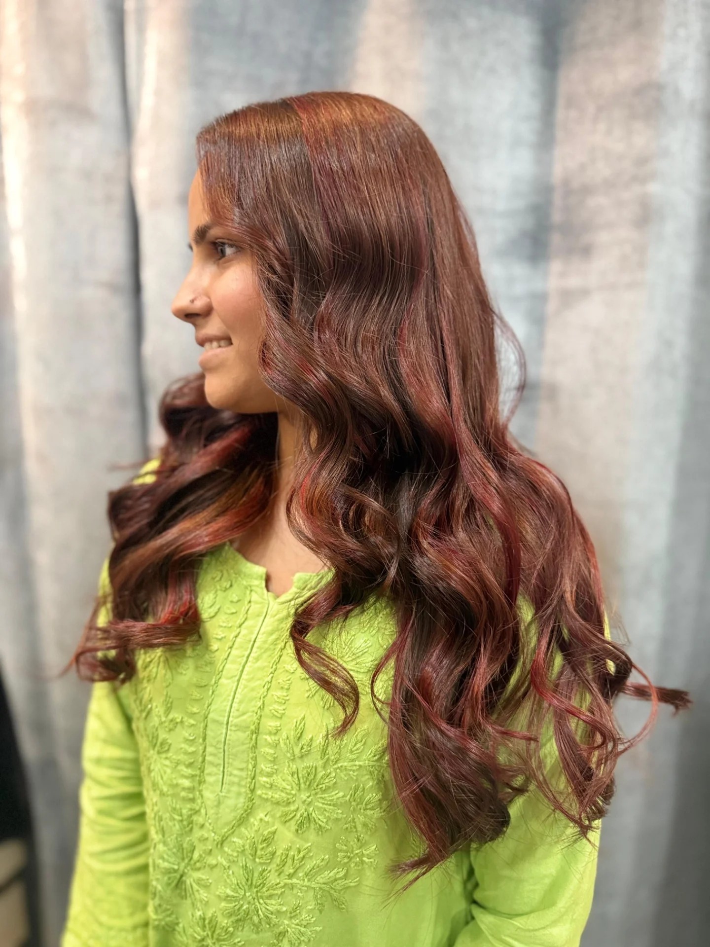 Glossy Burgundy Long Layered Waves with Magenta Accent Slices