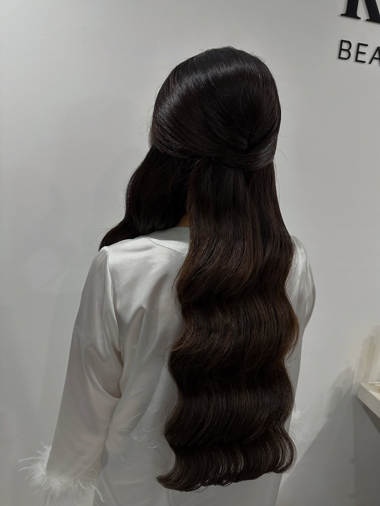 Glossy Espresso Half-Up with Concealed Crown Twist and Old-Hollywood Waves