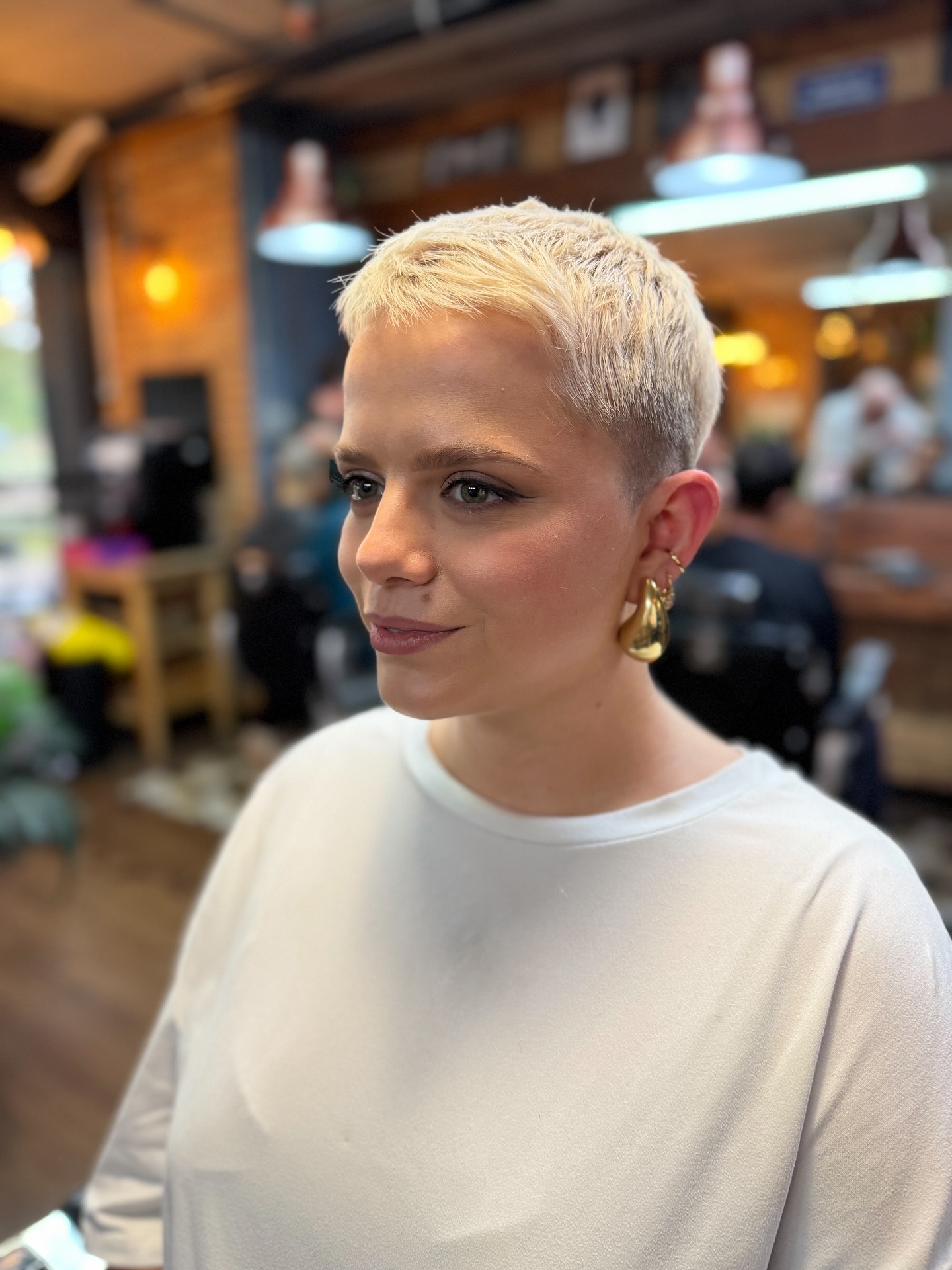 Icy Platinum Textured Buzzed Pixie with Tapered Nape