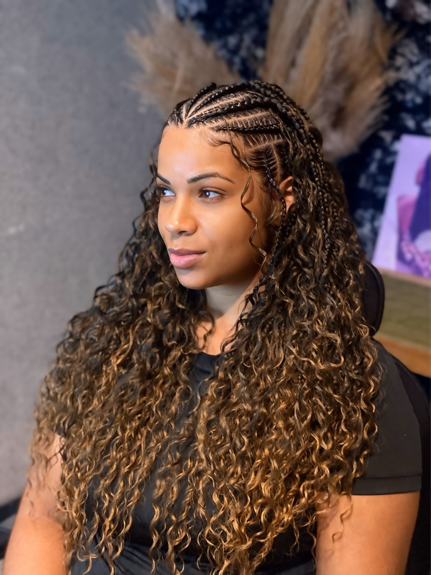 Knotless Crescent Cornrows into Long Caramel Spiral Curls