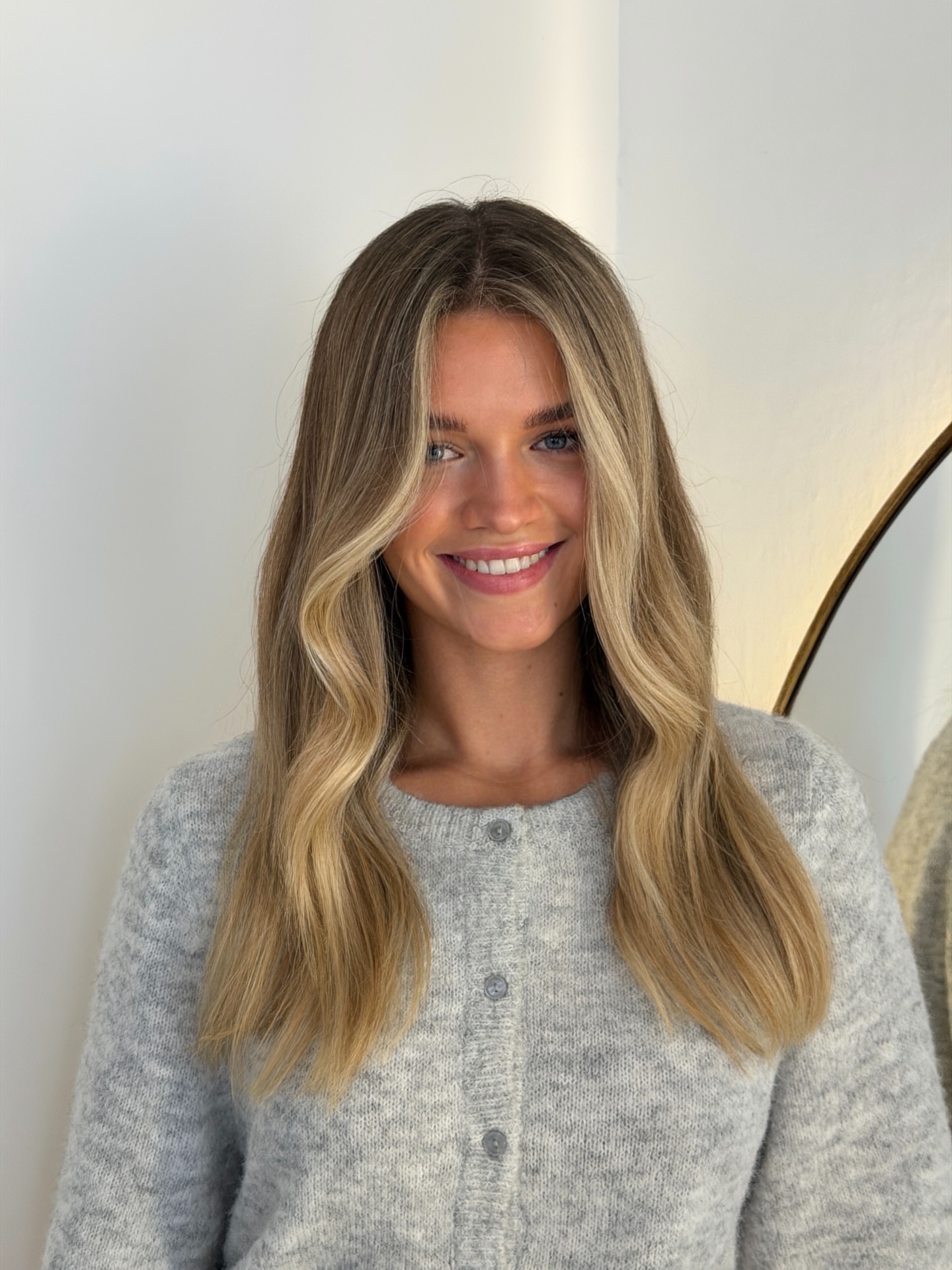 Long Soft Face‑Framing Layers with Low‑Contrast Balayage