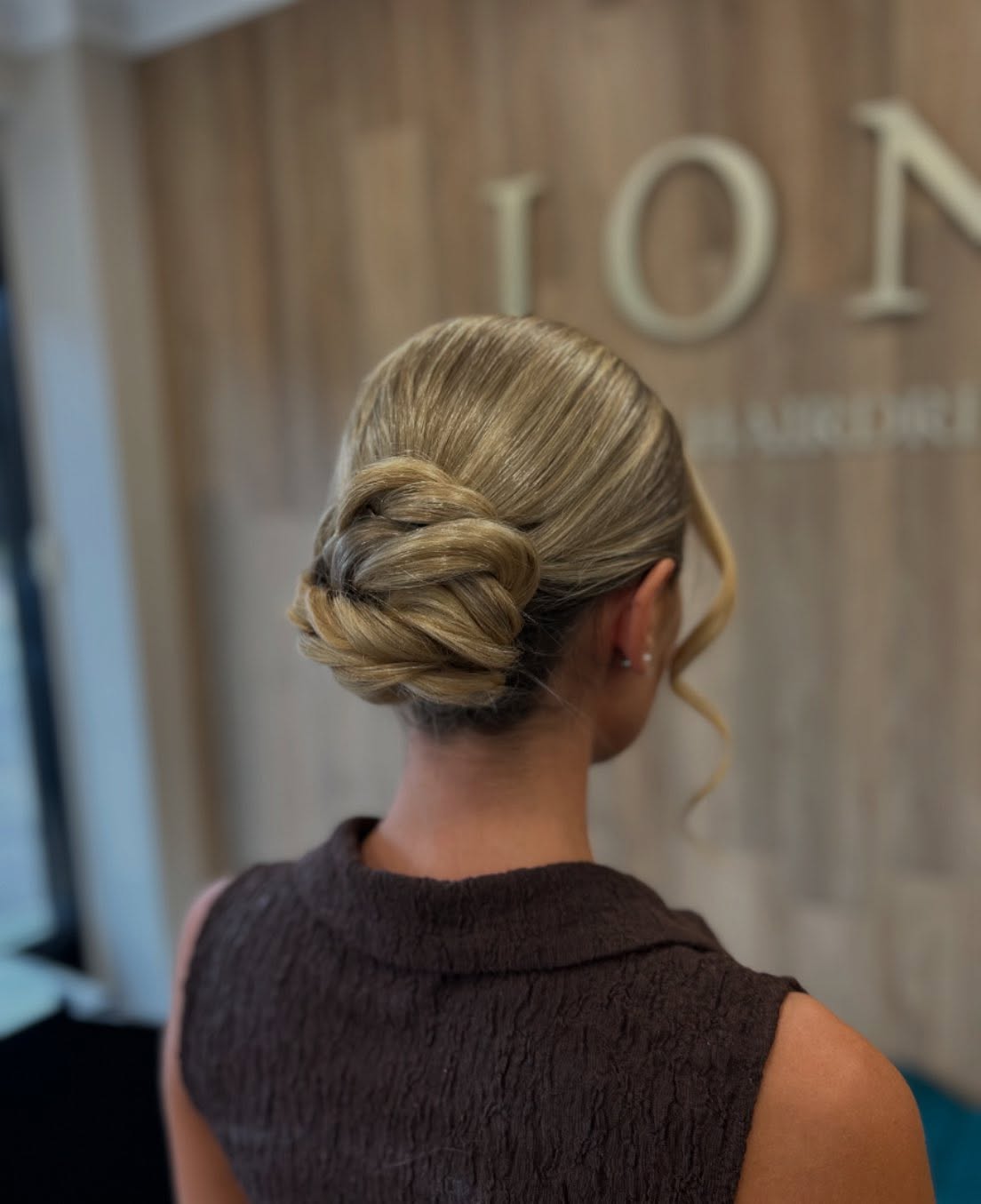 Polished Folded Low Bun with Ribboned Loops