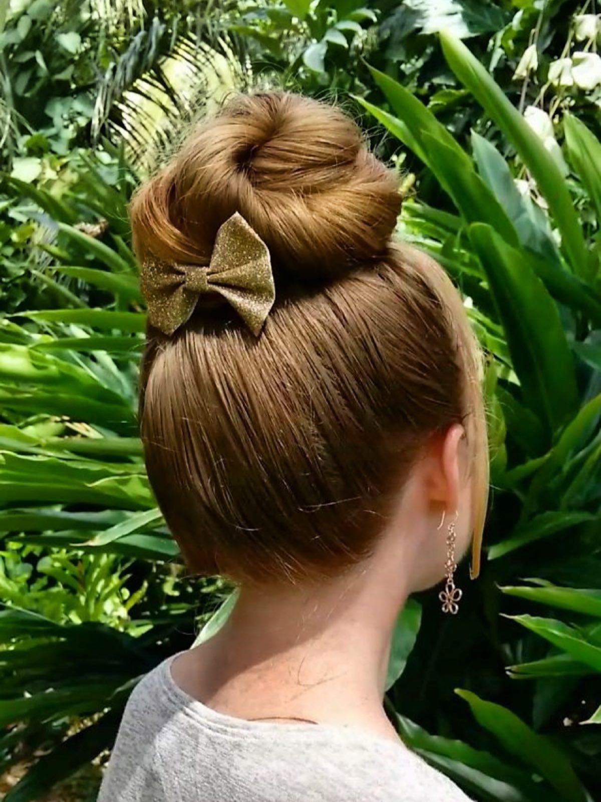 Polished Twisted Top-Donut Bun with Gold Bow Accent