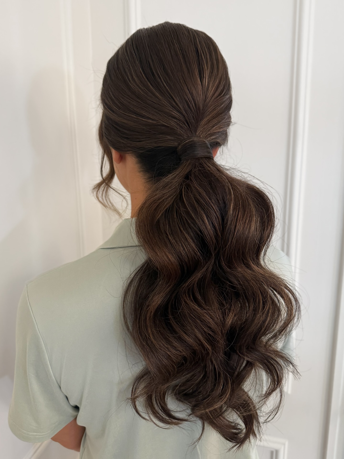 Polished Wrapped Low Pony with Long Wavy Layers