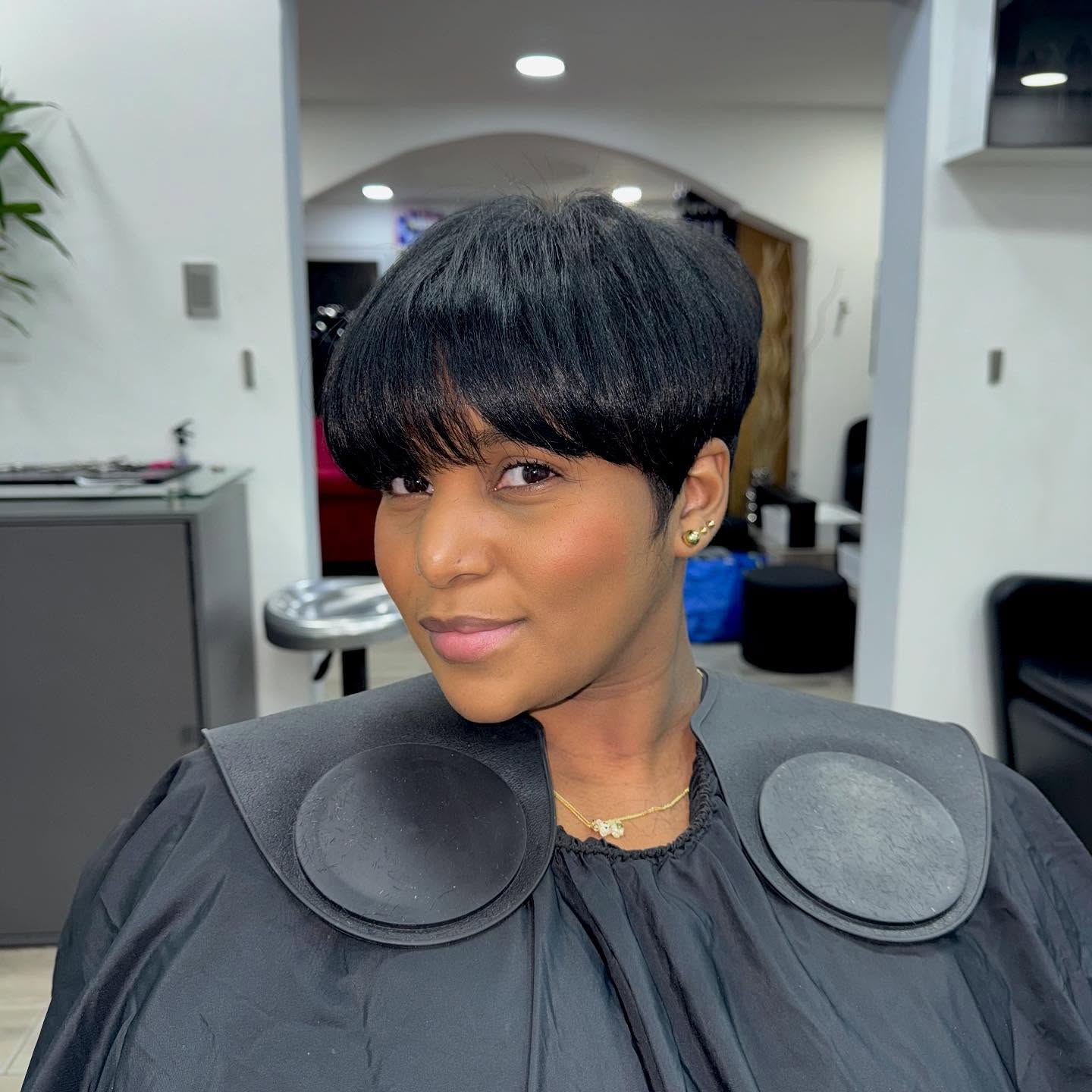 Rounded Pixie Bowl with Blunt Fringe and Ear Taper