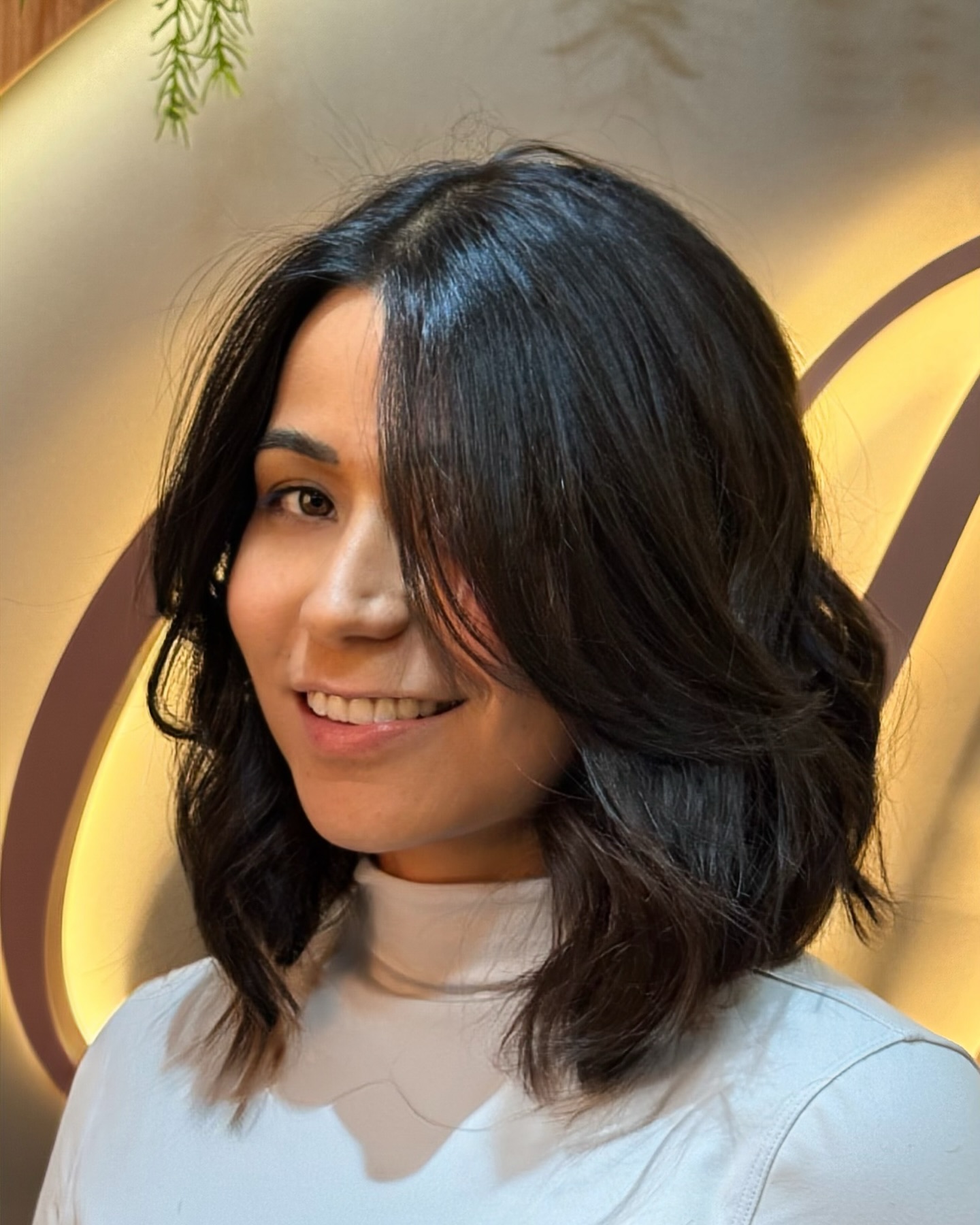 Rounded Shoulder-Length Layered Lob with Blown-Out Curtain Fringe