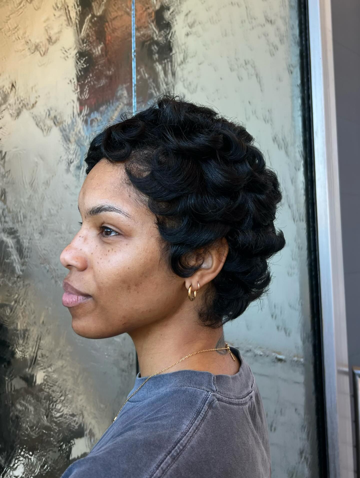 Sculpted Short Finger-Wave Pixie with Low Taper