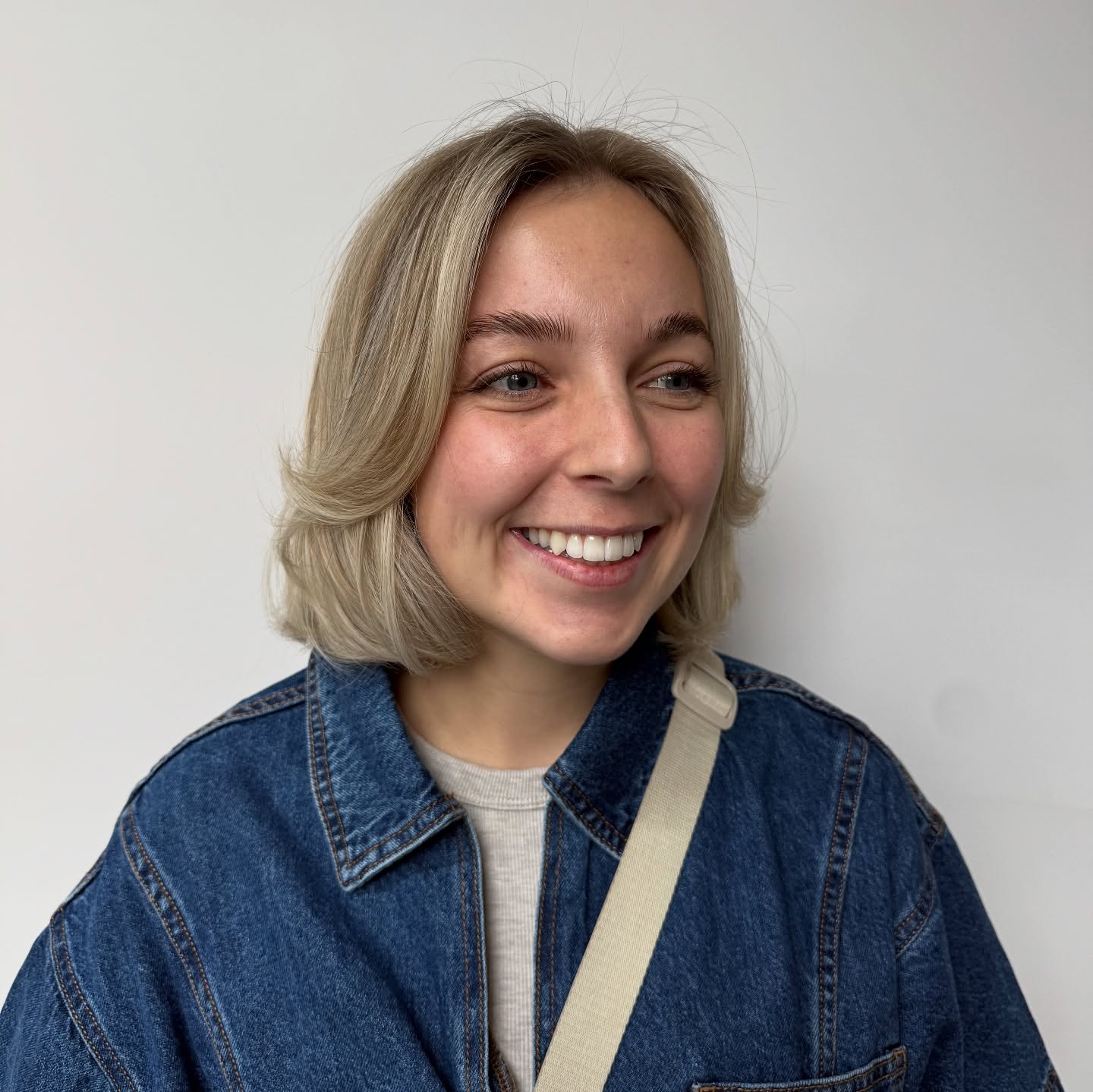 Short Blunt Bob with Soft Curtain Flicks in Ash Blonde