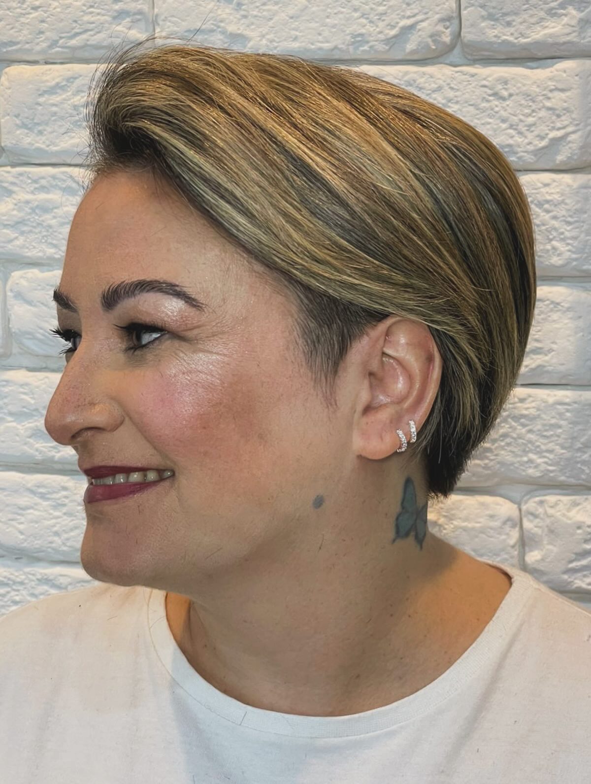 Short Swooped Graduated Pixie with Warm Rooted Balayage