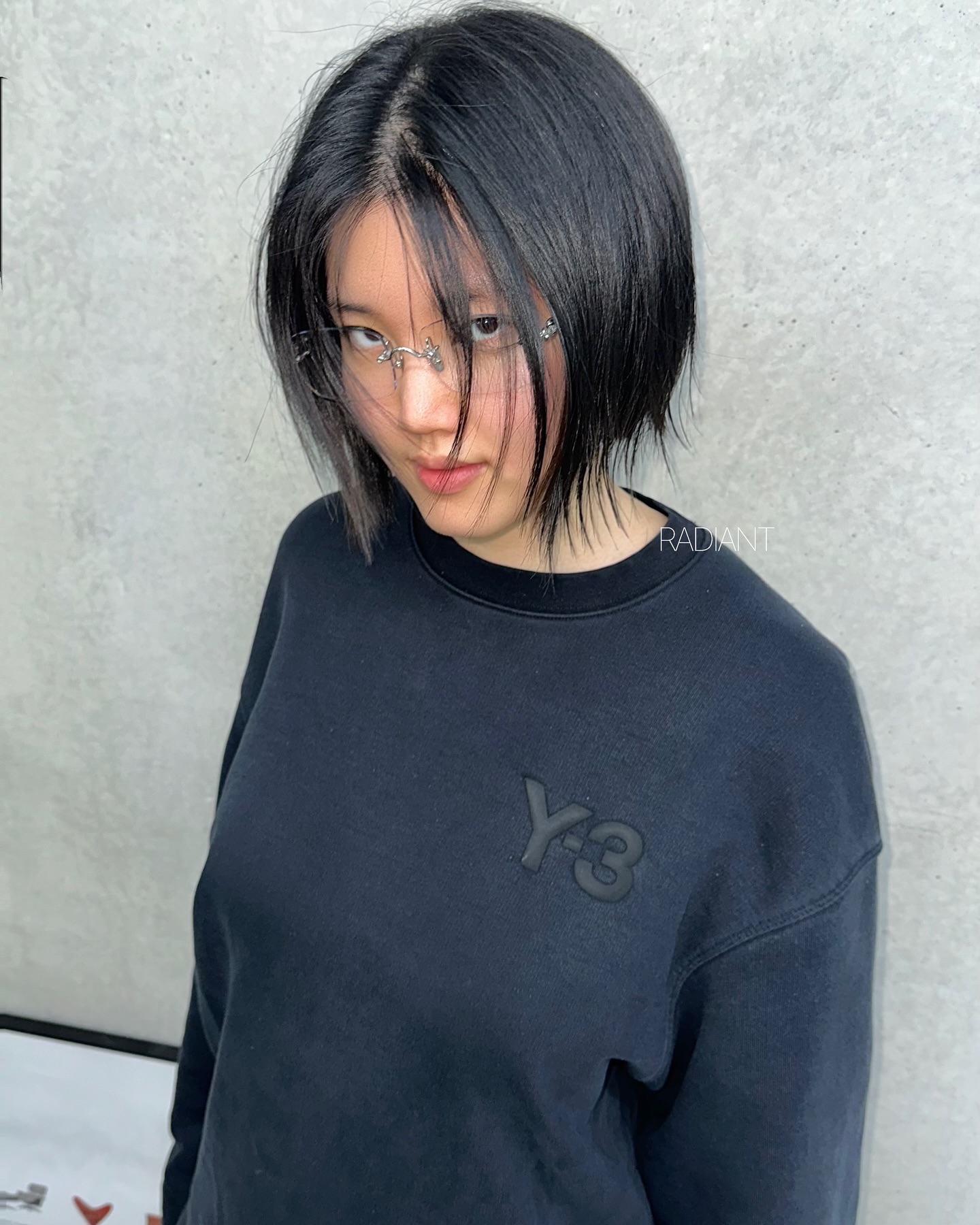 Sleek Angled Chin-Length Bob with Wispy Face-Framing