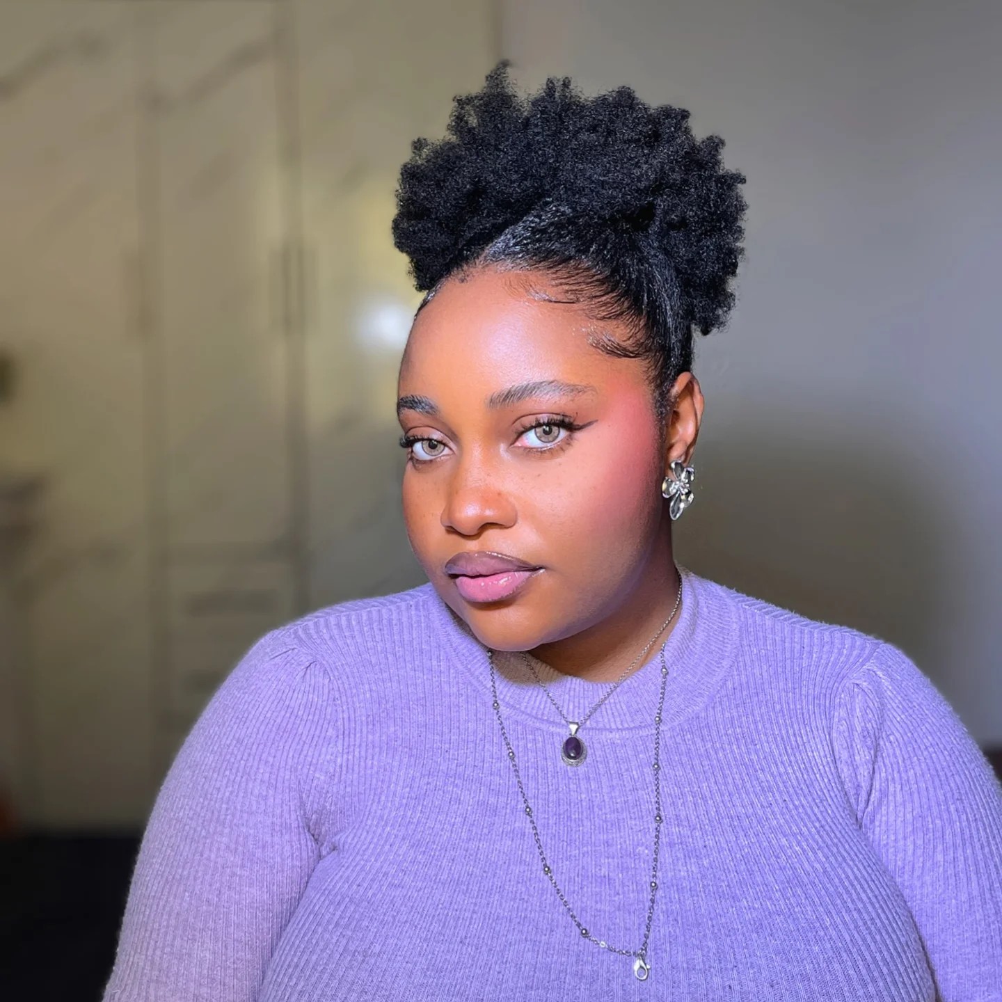Sleek Diagonal-Part High Puff with Defined Edges