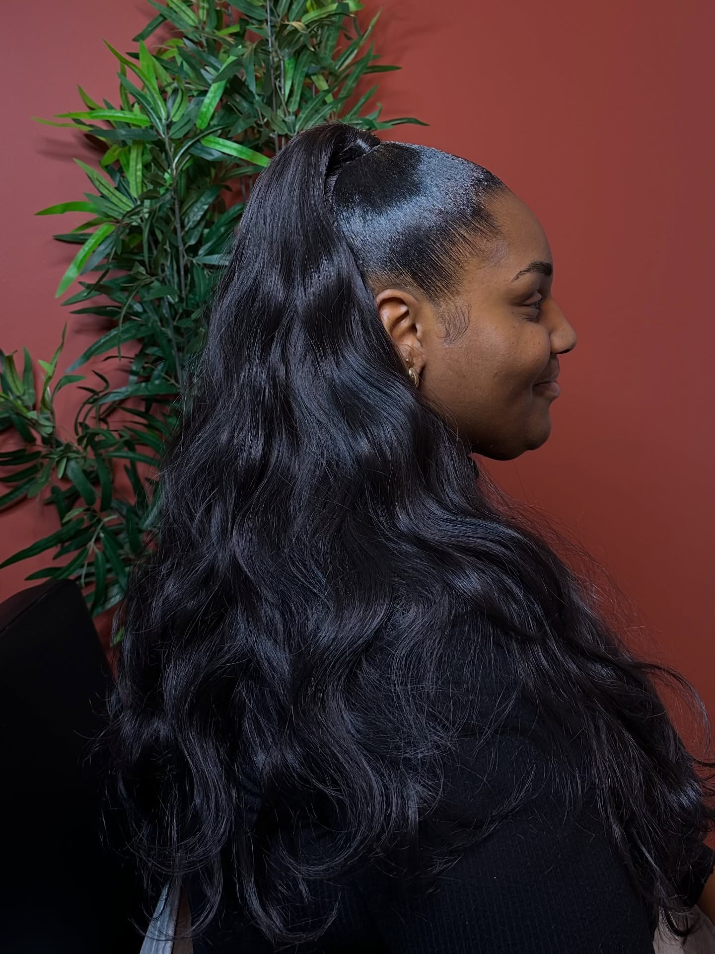 Sleek High Ponytail with Wrapped Band and Long Body-Wave Extensions