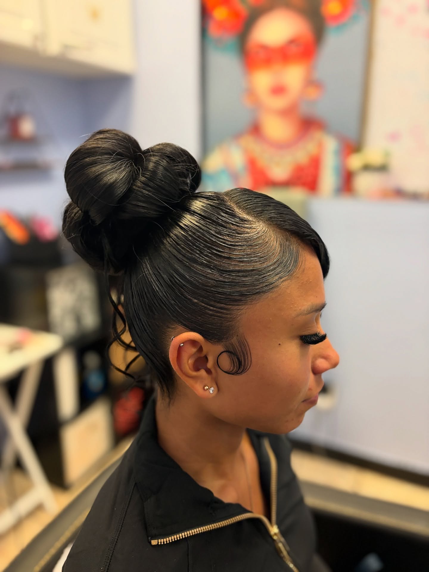 Sleek Looped Bow High Bun with Sculpted Baby Hairs
