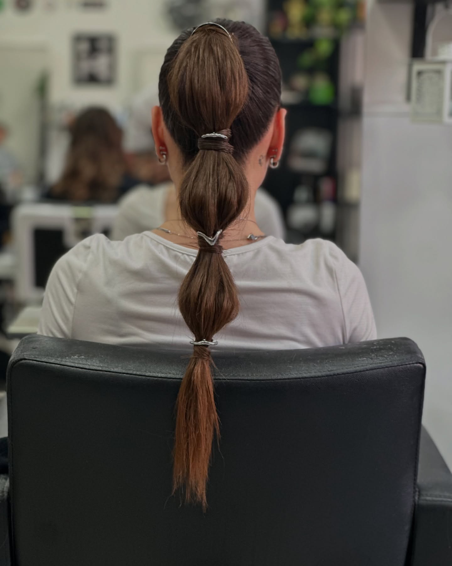 Sleek Multi-Anchor Bubble Ponytail with Subtle Ombre Ends