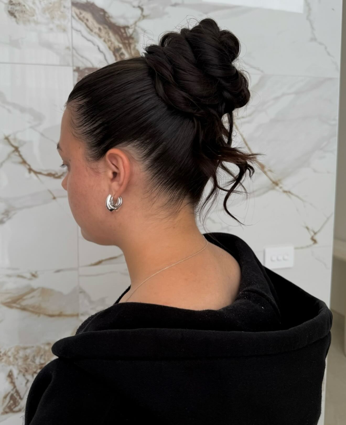 Sleek Rope-Twisted Stacked Topknot with Tapered Nape