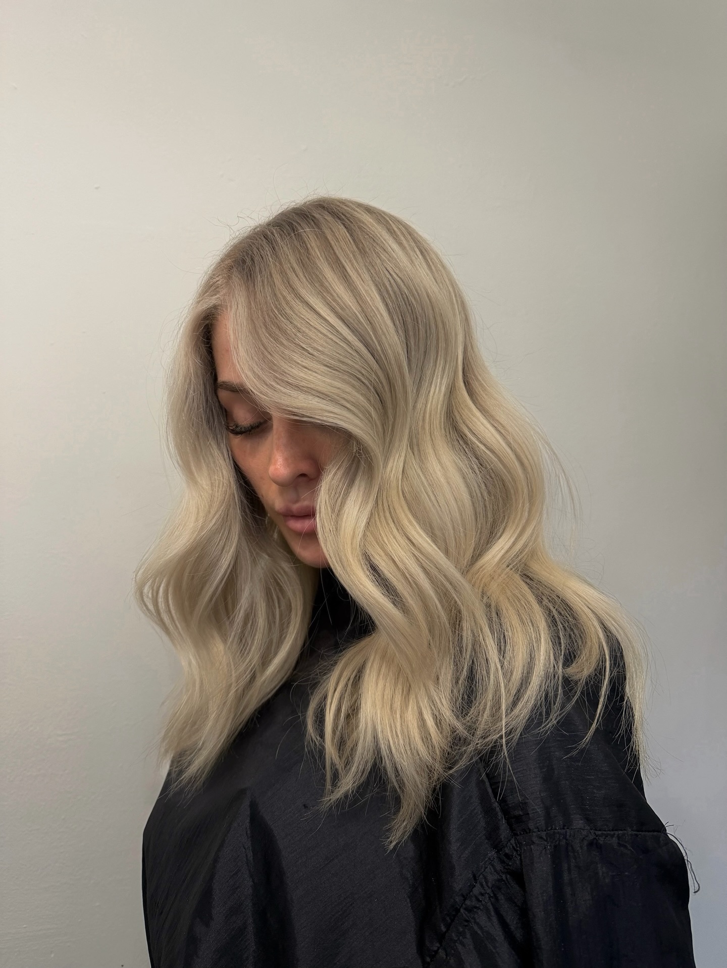 Soft Ash-Blonde Mid-Length Waves with Shadow Root