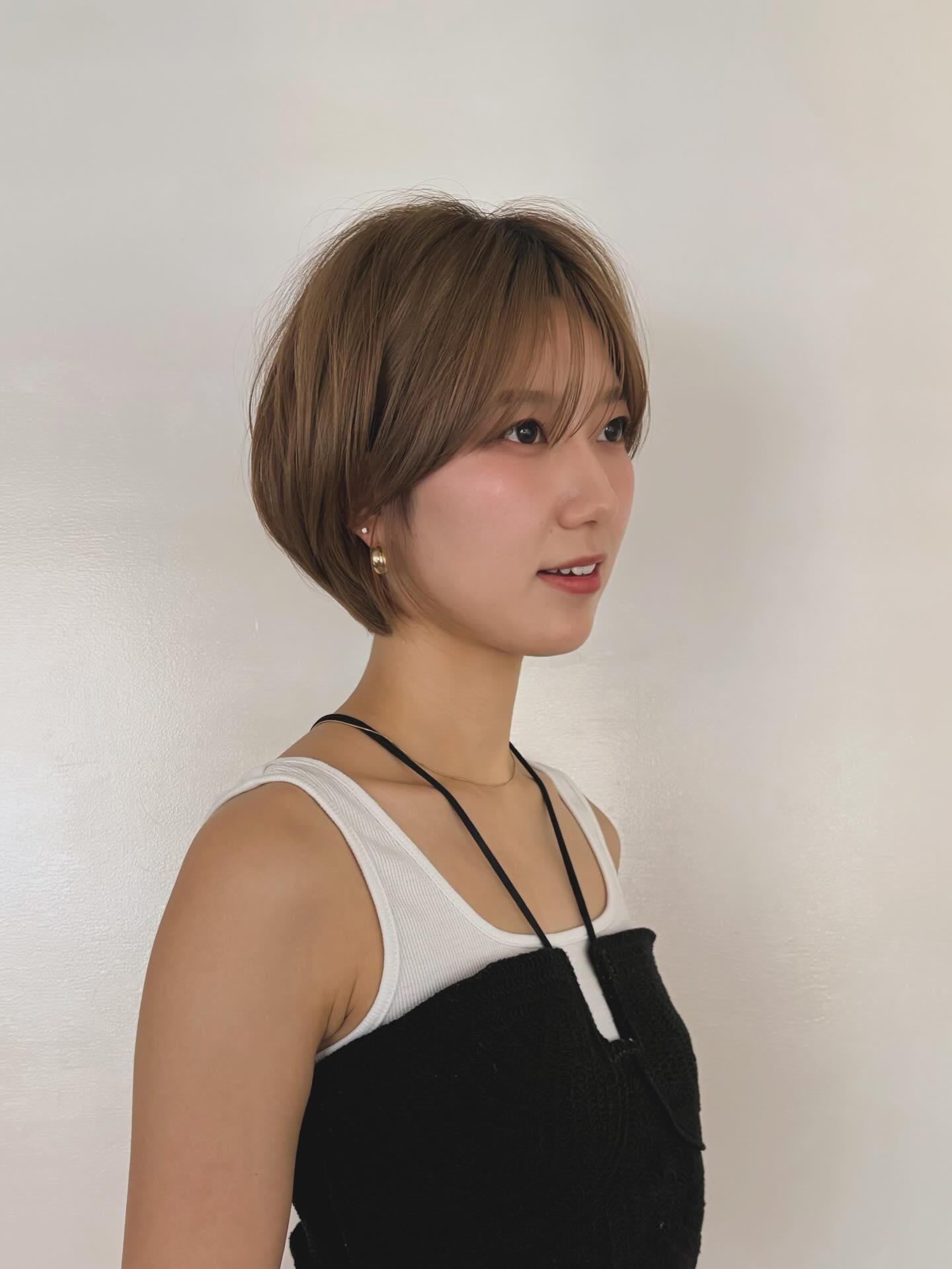 Soft Ash Brown Rounded Bob with Wispy Curtain Fringe