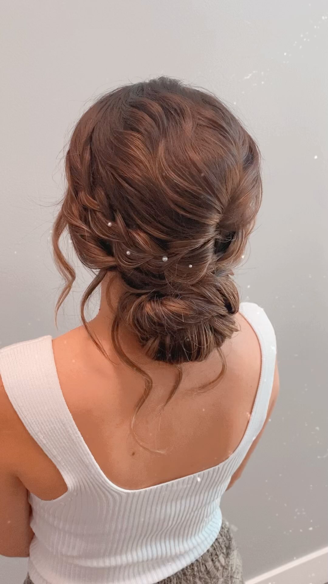 Soft Twisted Low Knot Bun with Pearl Accents