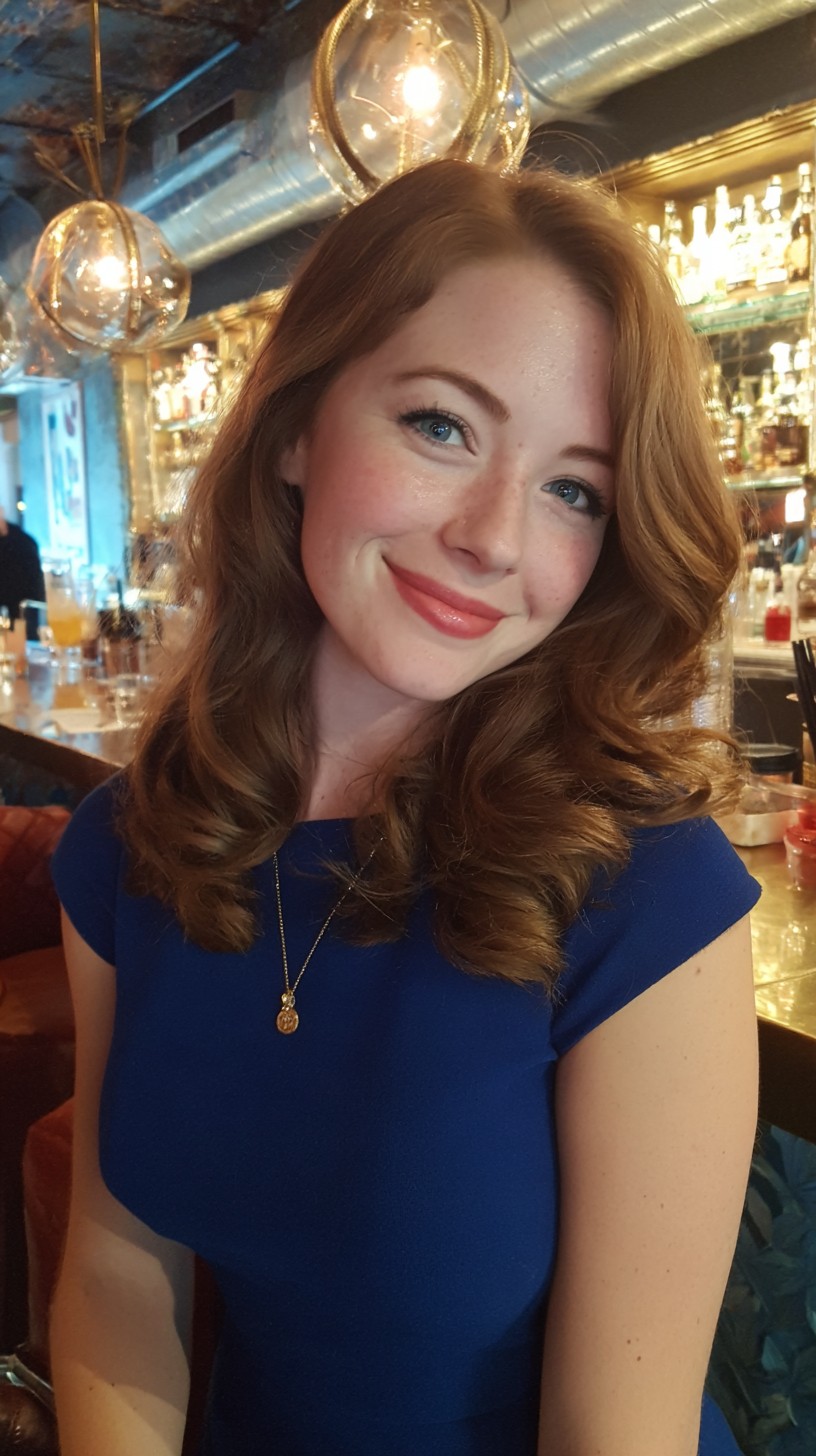 Soft Voluminous Copper Waves with Side-Swept Face-Framing Layers