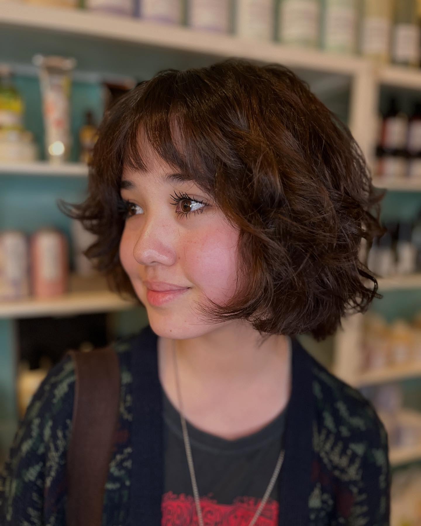 Textured Chin-Length Wavy Bob with Feathered Mini Bangs