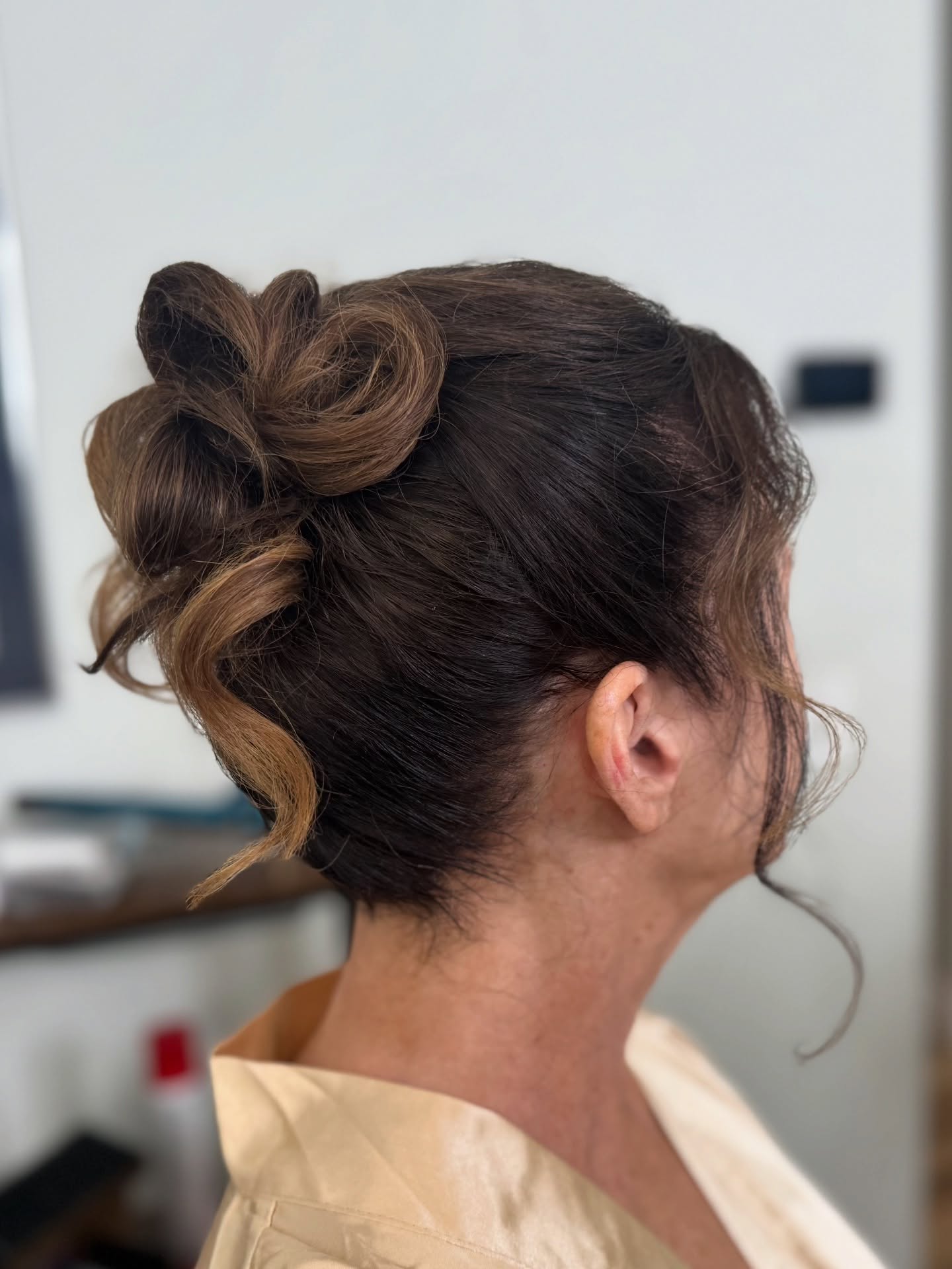 Textured Loop Updo with Face-Framing Balayage Tendrils