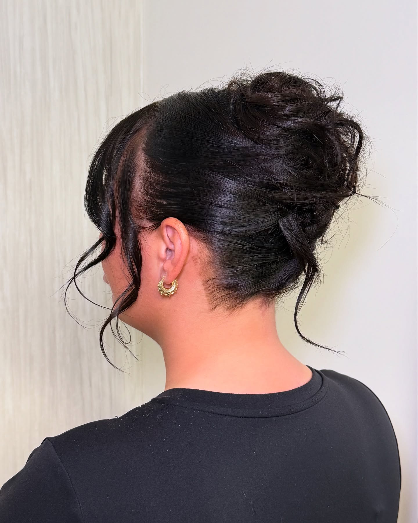 Textured Low-Tuck Updo with Tapered Nape and Face-Framing Tendrils