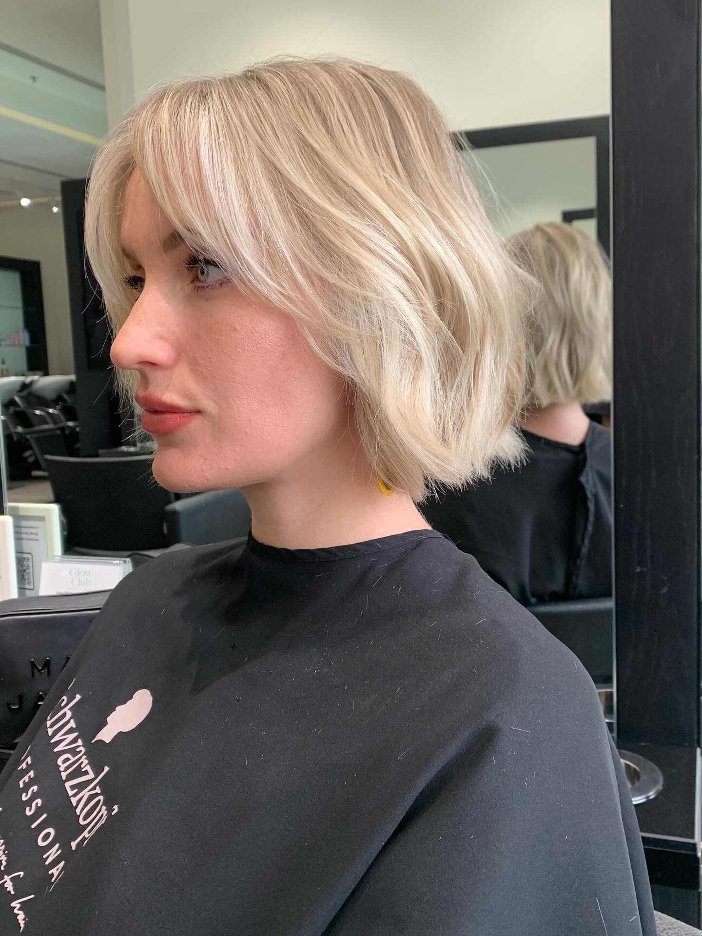 Textured Platinum Chin-Length Bob with Soft Curtain Bangs