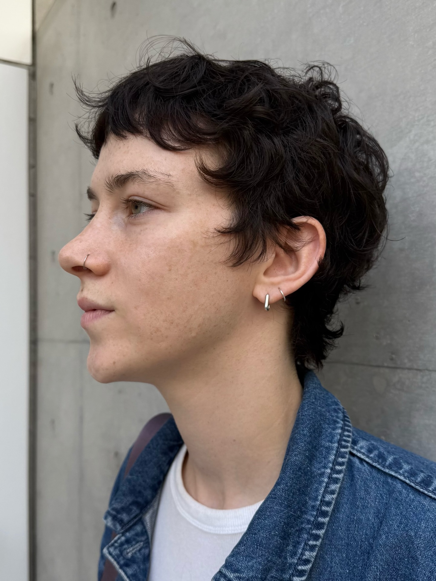 Textured Short Curly Pixie with Micro Fringe and Tapered Nape