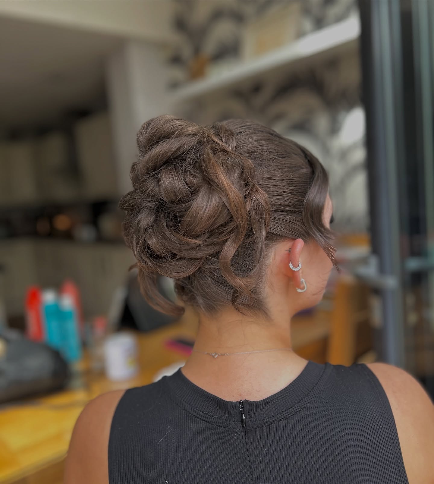 Textured Twisted Low Bun with Sculpted S-Tendril