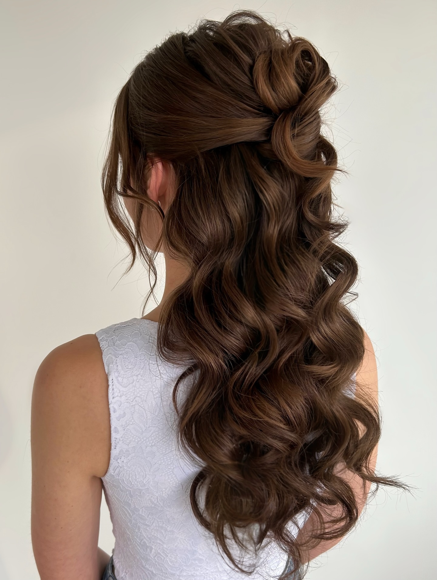 Twist-and-Loop Half-Up with Sculpted Barrel Waves