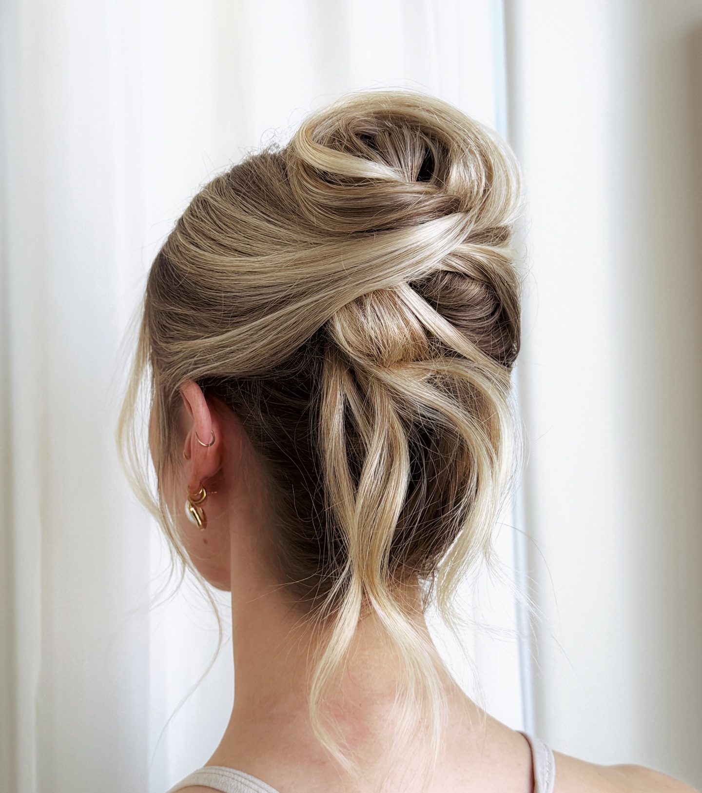 Twisted Ribbon Blonde Updo with Root Shadow