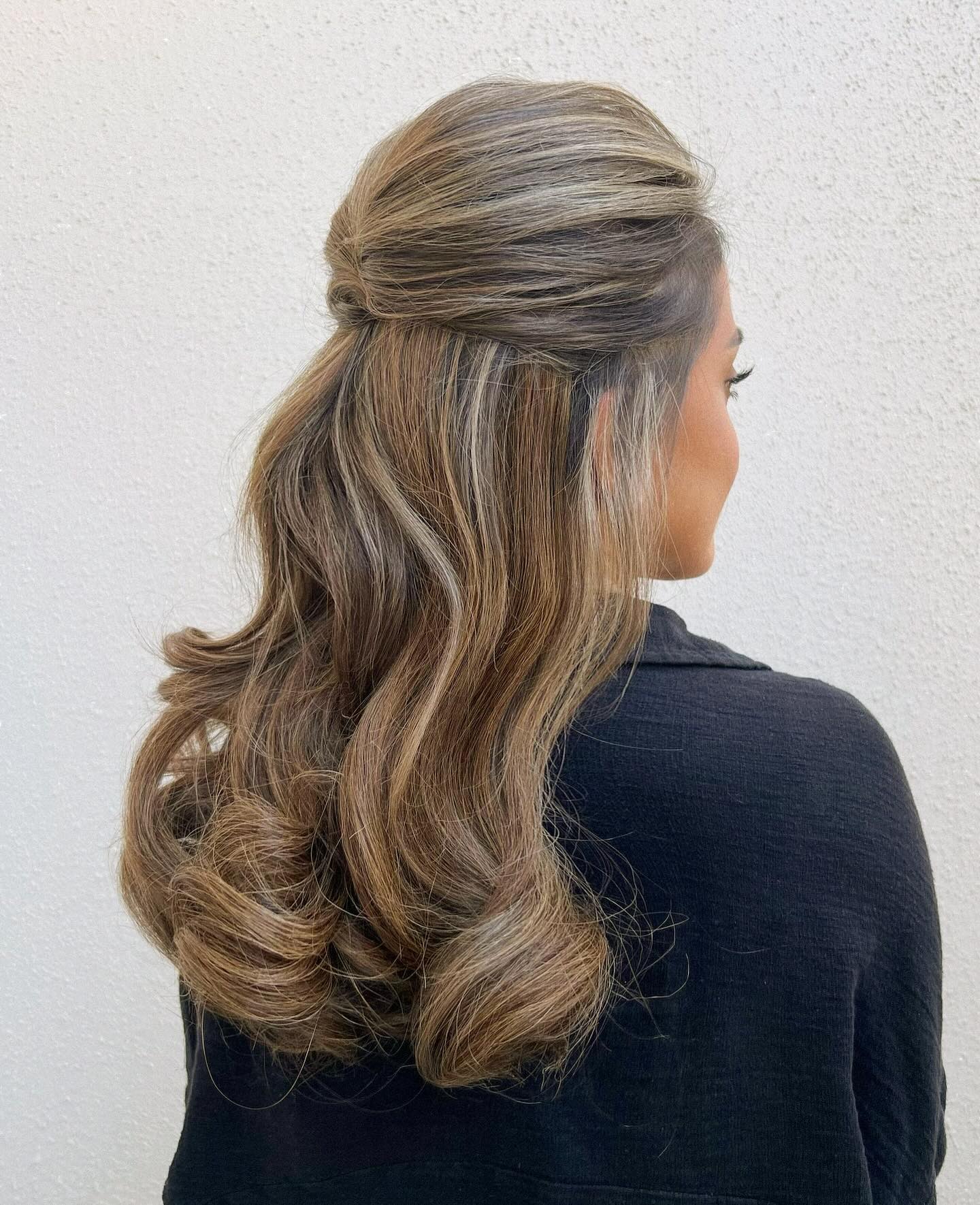 Volumized Half-Up Wrapped Twist with Soft S-Waves